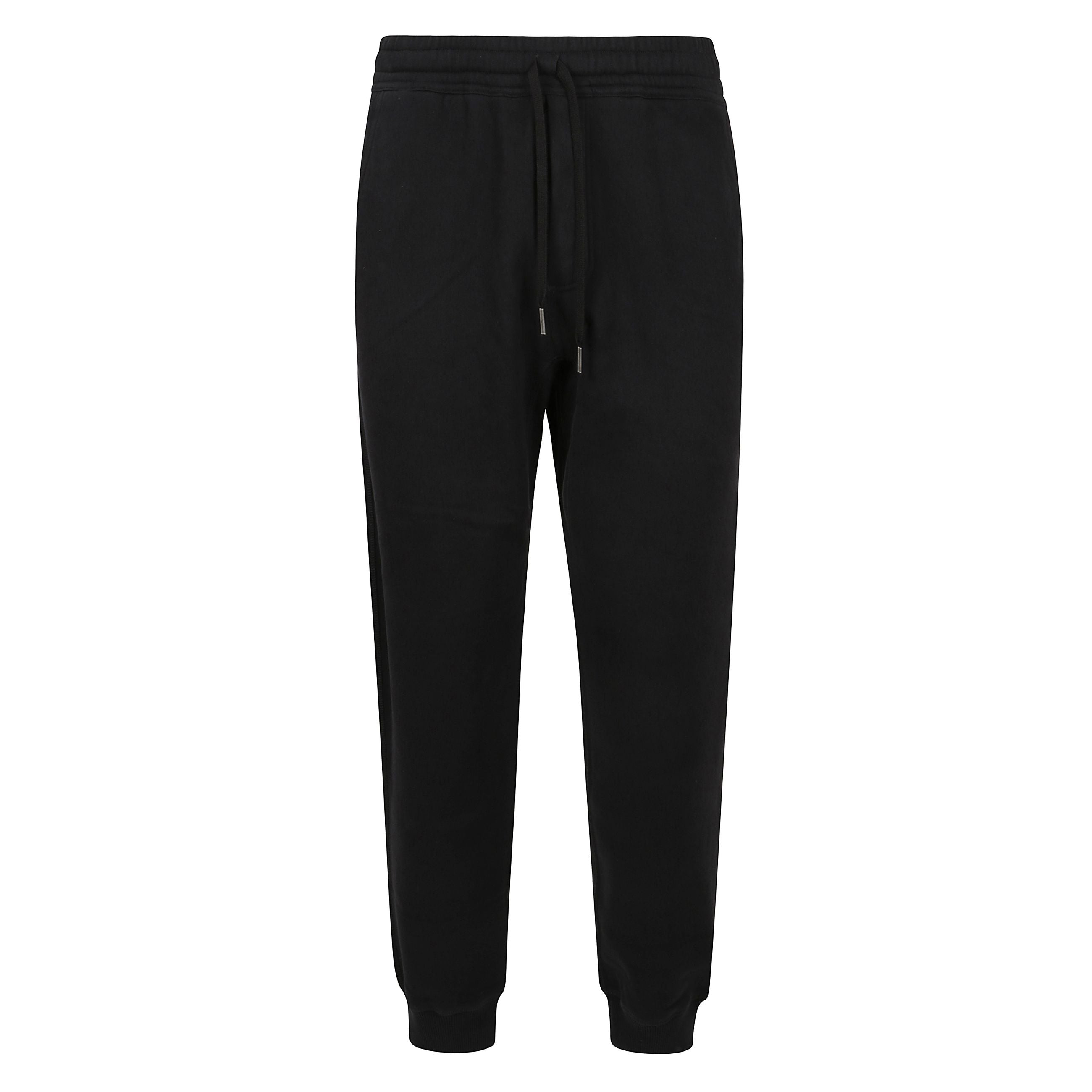 Pantalone 'travel' in cotone, vita elasticizzata con coulisse, due tasche laterali, logo a contrasto, bottoni nascosti da patta, orlo con fascia elasticizzata, due tasche nel retro