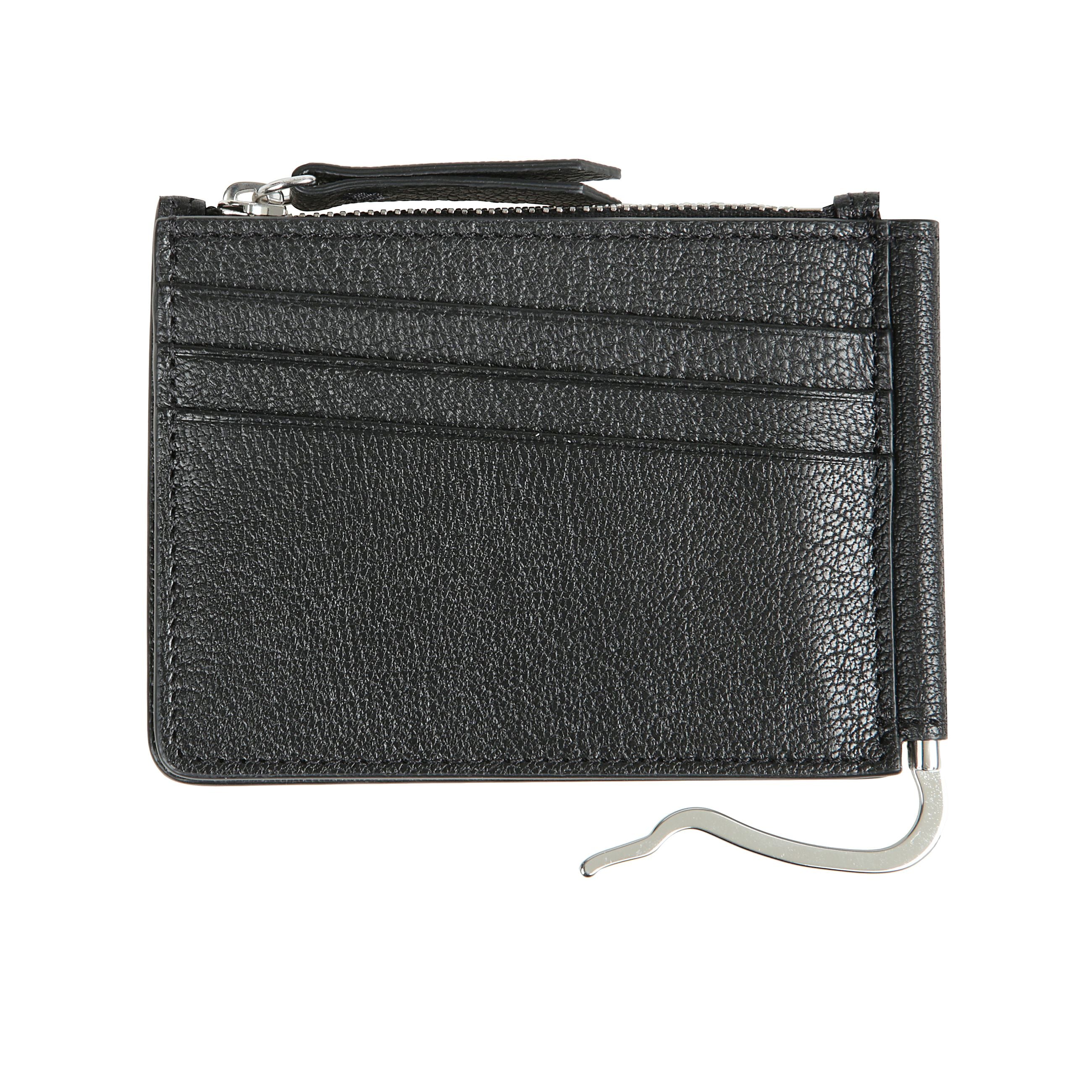 Portafoglio con quattro punti di cucitura in pelle.