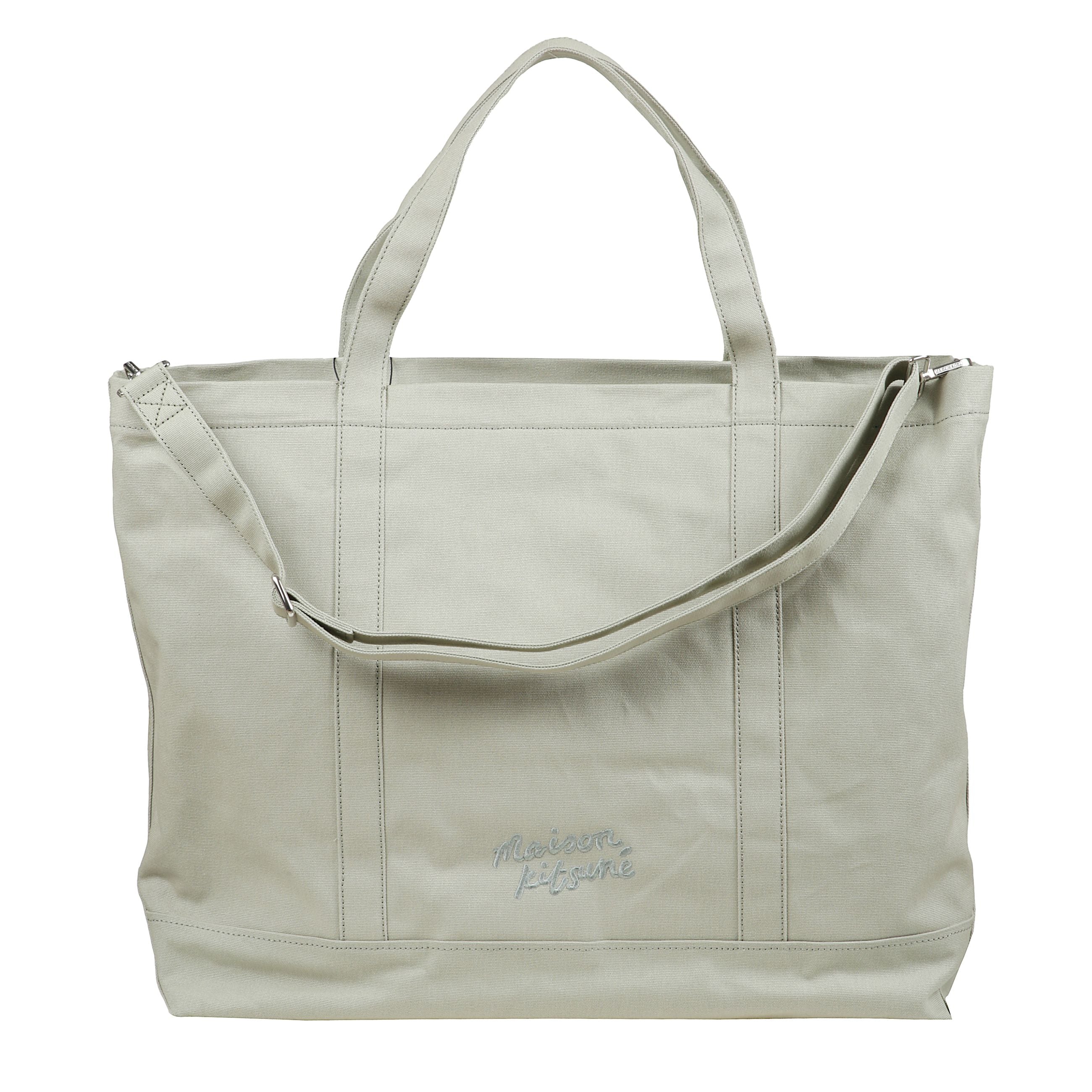 La borsa fox head grande presenta il logo testa di volpe di maison kitsuné sul retro a due manici.