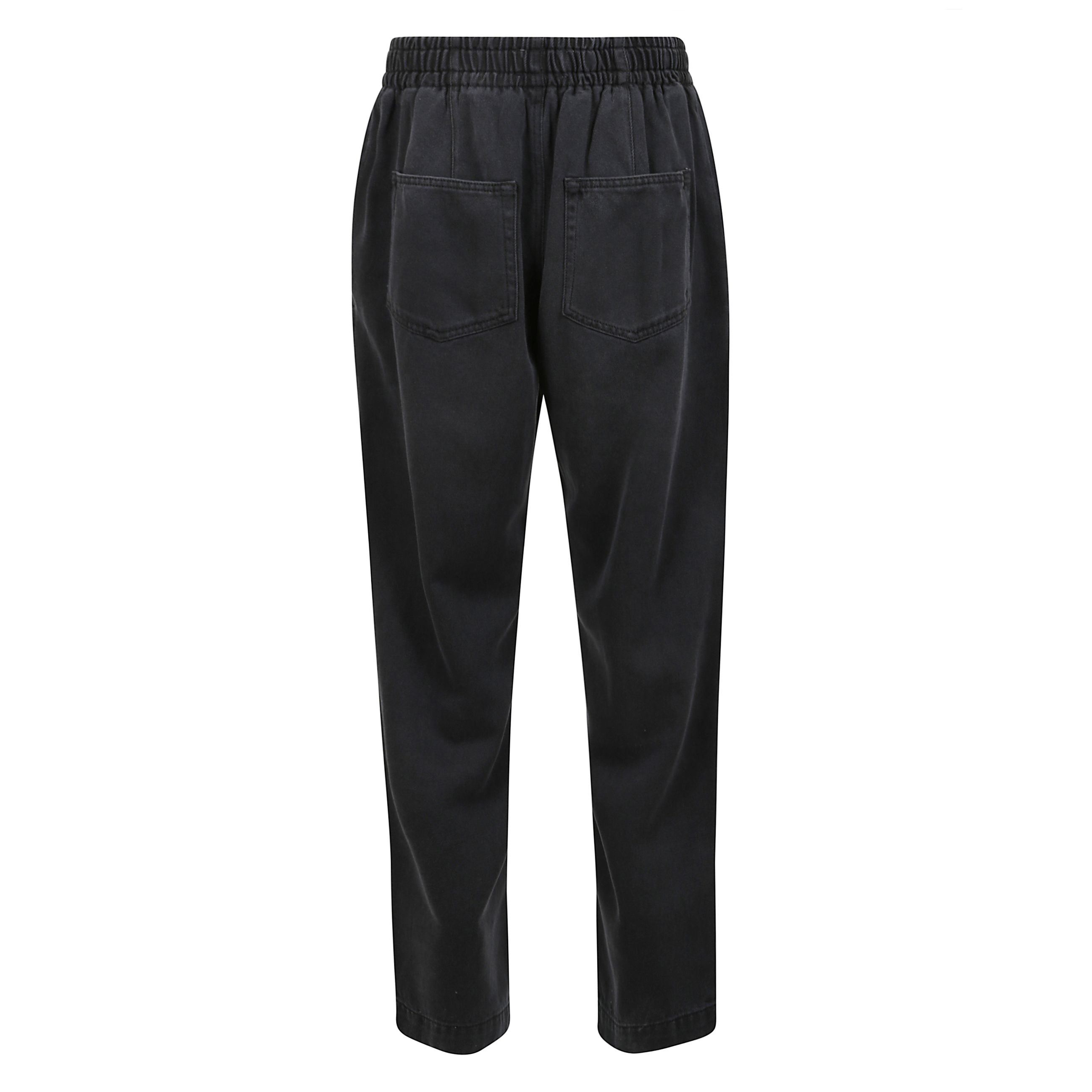 Jeans a gamba larga timeo, chiusura con bottoni ed elastico in vita.