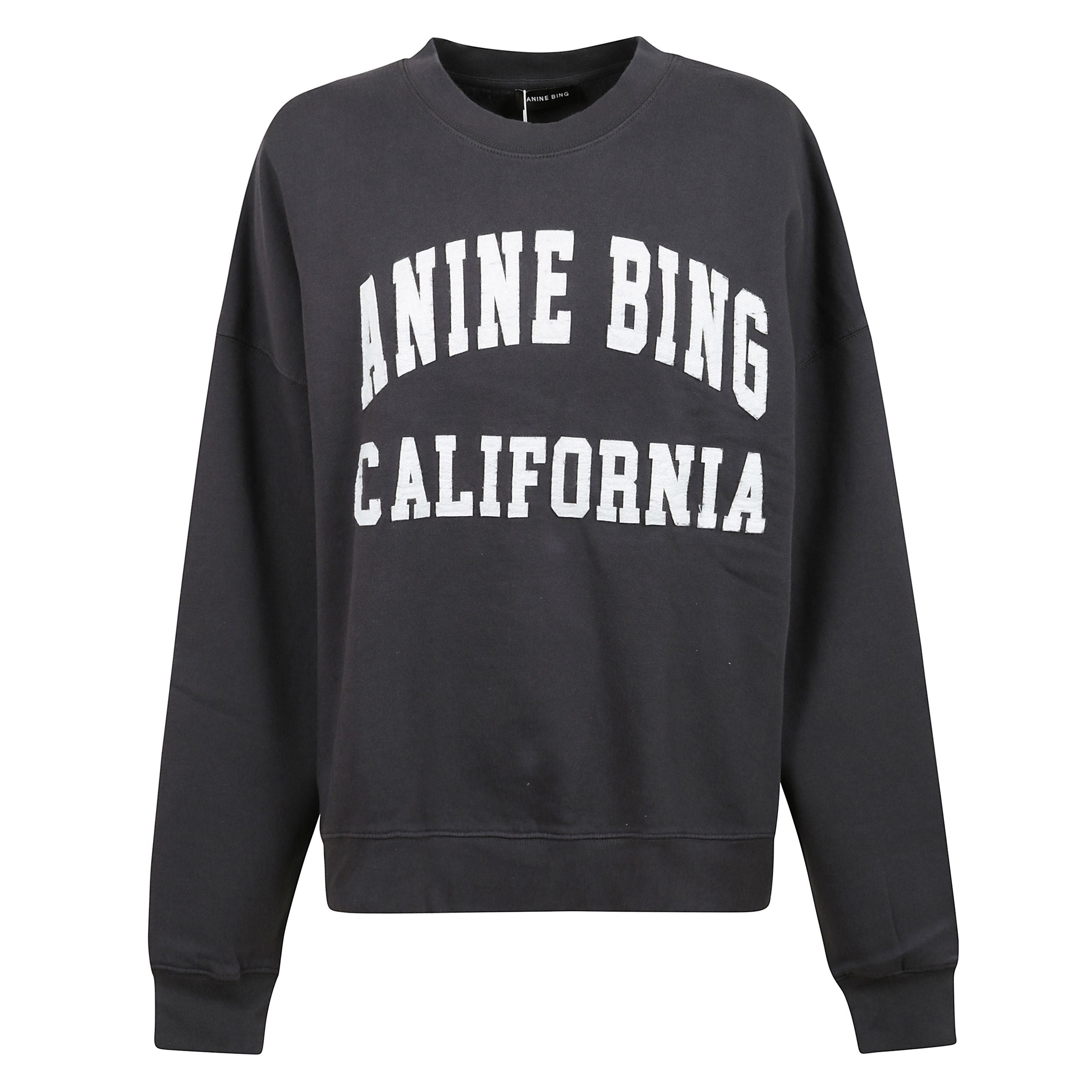 Felpa modello miles in cotone felpato con lavaggio vintage. presenta patch in feltro bianco sul petto con logo.