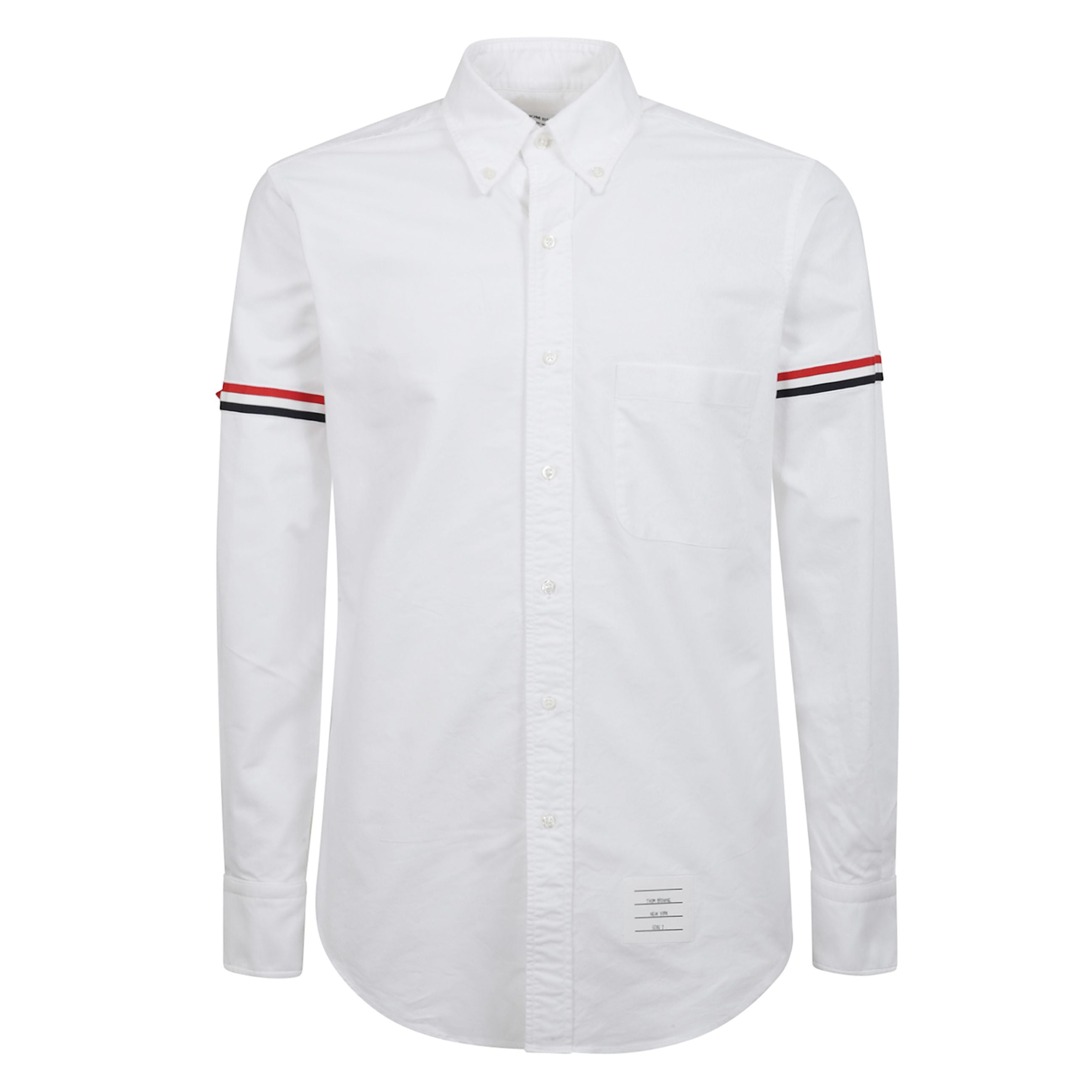 Camicia classica in cotone a manica lunga. colletto classico button down. tasca sul petto. orlo arrotondato. fascia in grosgrain a righe sulle maniche e passante a righe sul retro distintivi del brand thom browne.
