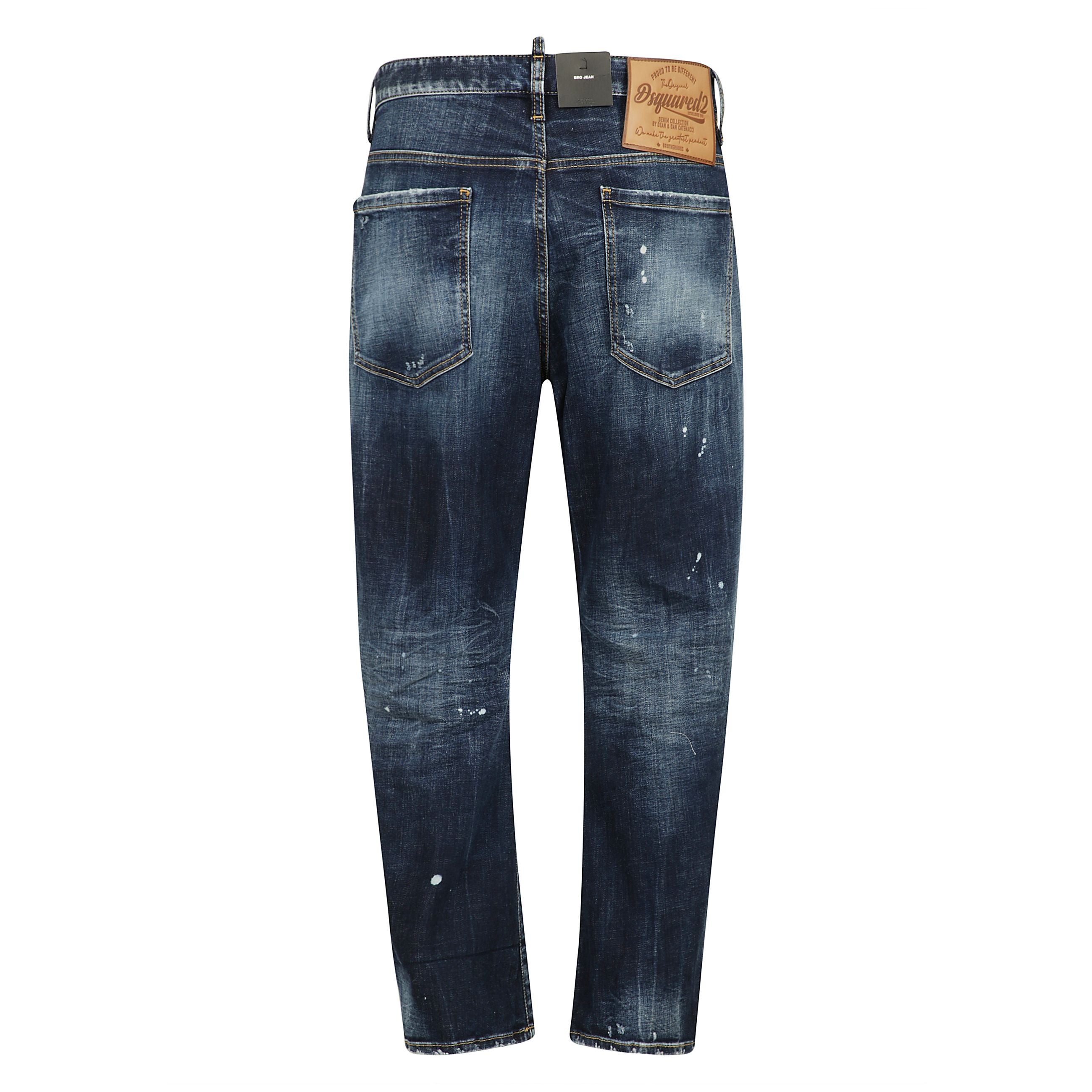 Denim stretch a cinque tasche
con chiusura a bottoni nascosti e logo a contrasto applicato sulla chiusura