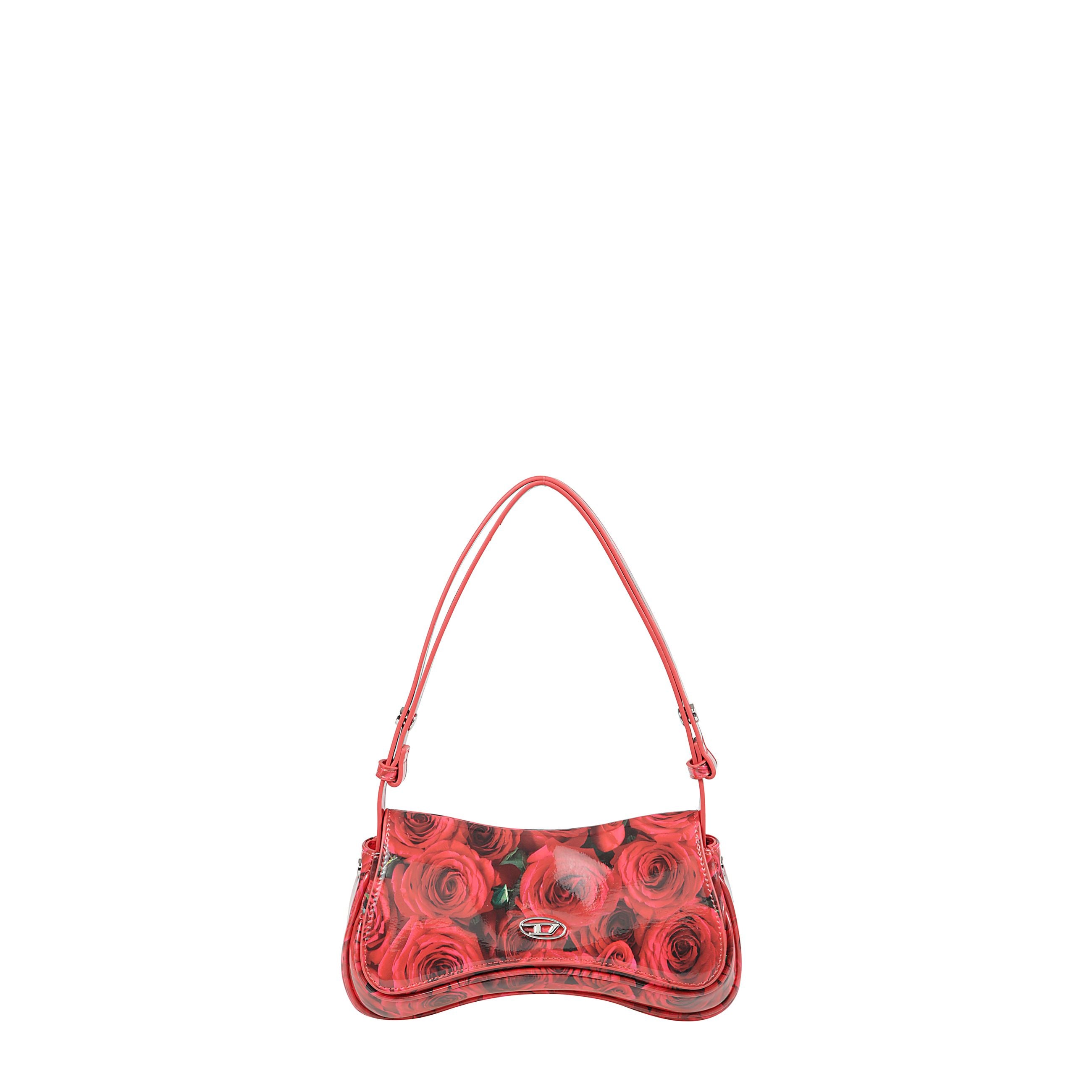 Questa clutch versatile ha una forma ironica, ispirata ai controller per videogiochi. realizzata in pu riciclato lucido con stampa all-over, è decorata con una placca metallica oval d sulla patta. la tracolla regolabile permette di indossarla crossbody o