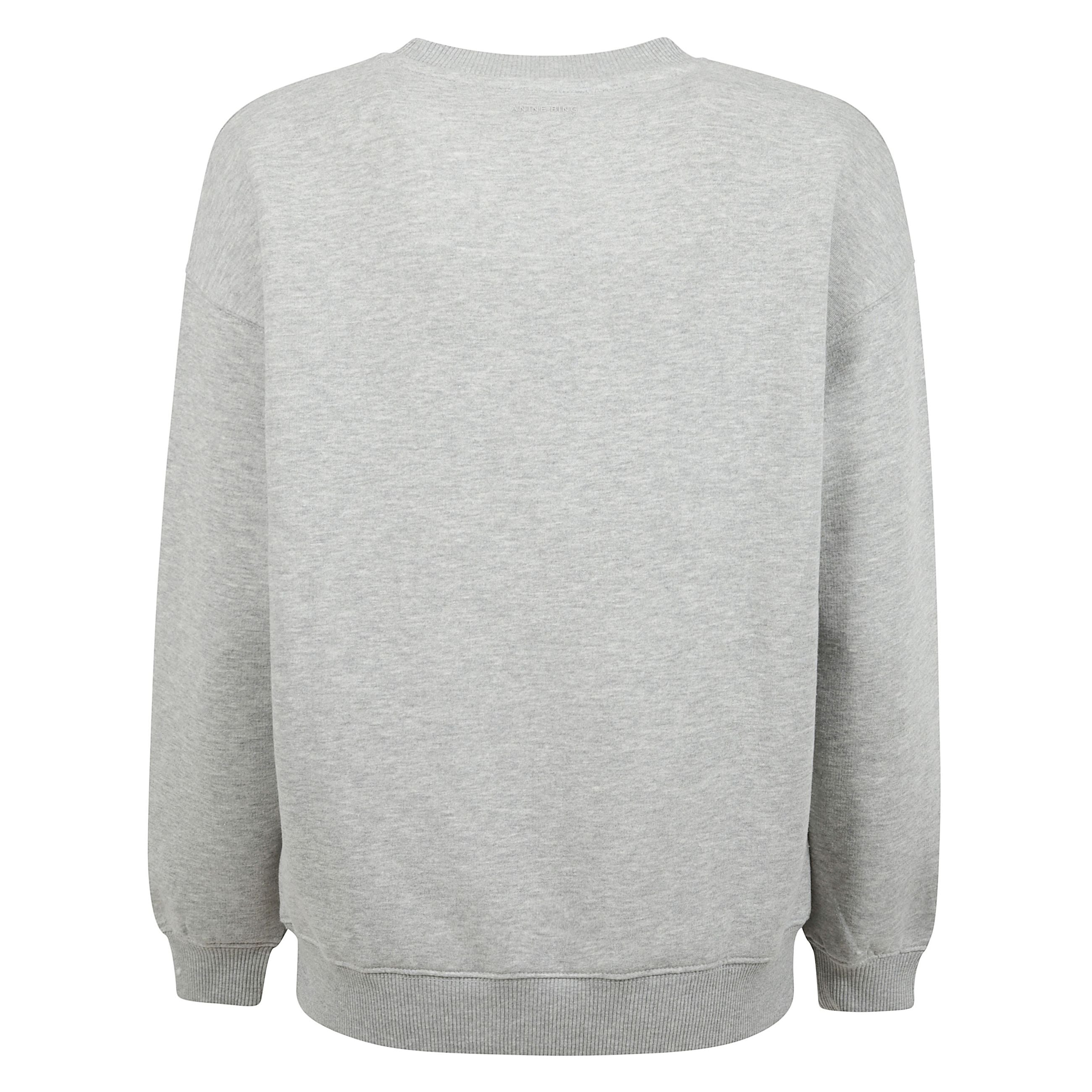 Felpa in cotone con una vestibilità boxy che dona un appeal rilassato e moderno. il design essenziale è valorizzato dal logo frontale color blu navy, elemento distintivo del brand. completata da collo a giro, maniche lunghe e finiture a costine su polsi