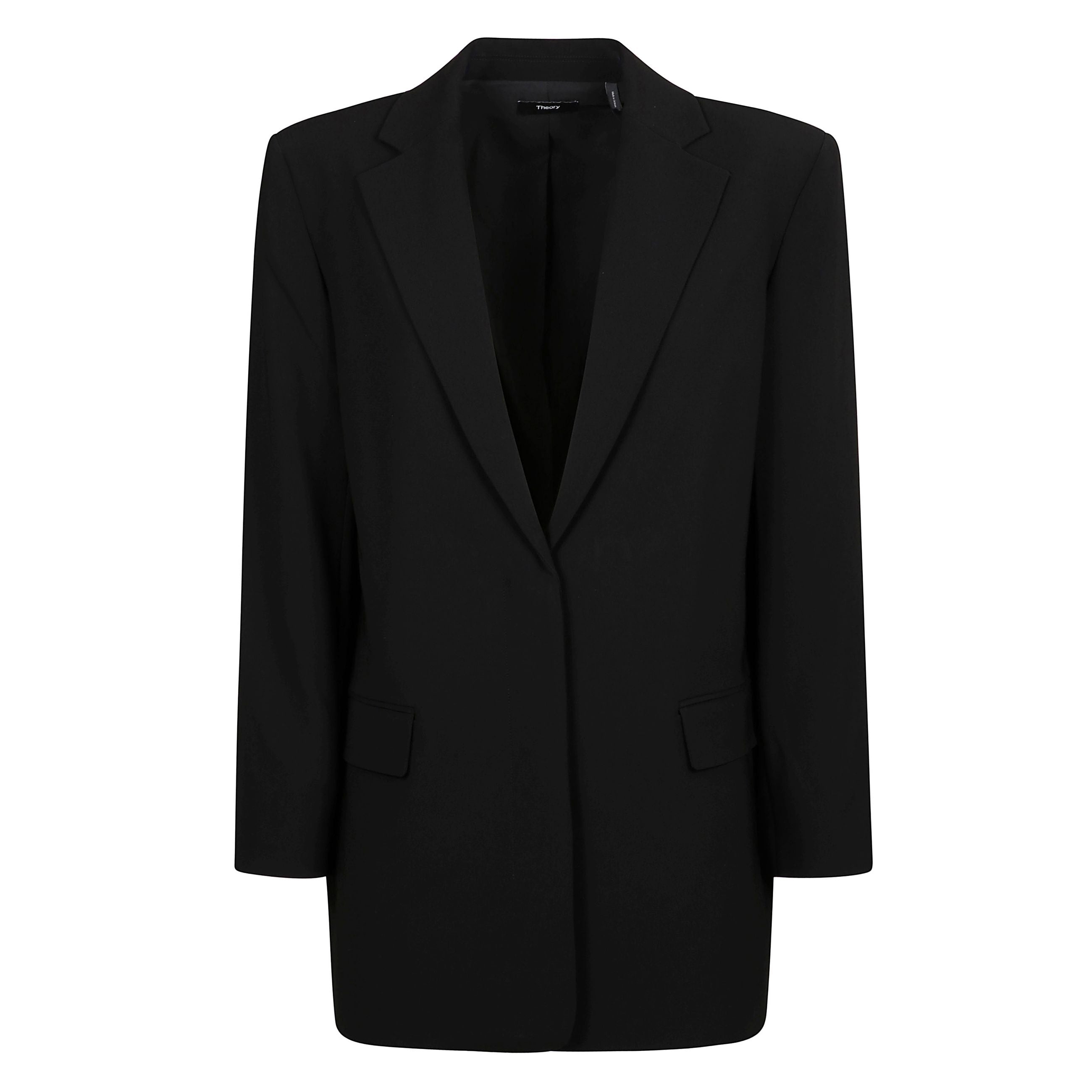 Blazer in crêpe nero con abbottonatura frontale nascosta
e spalline