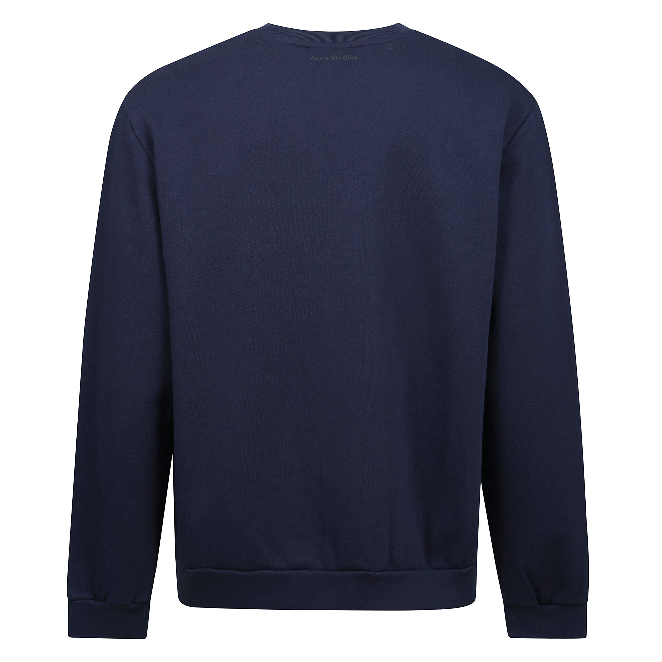 Maglia realizzata in pile di cotone con una morbida finitura spazzolata, decorata con logo face stagionale ricamato e logo sul retro. vestibilità regular unisex.