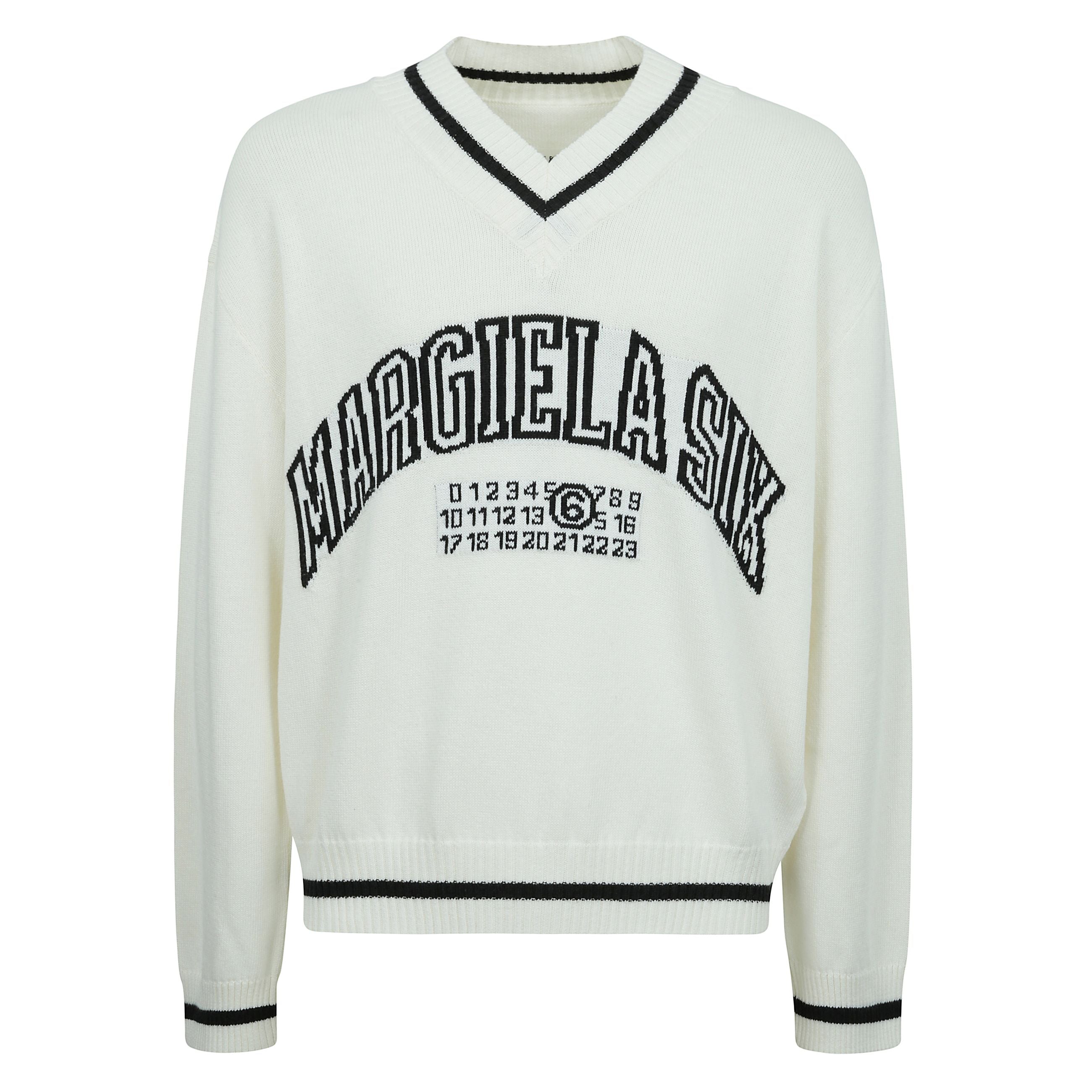 Maglione in misto lana a taglio largo con scollatura a punta.