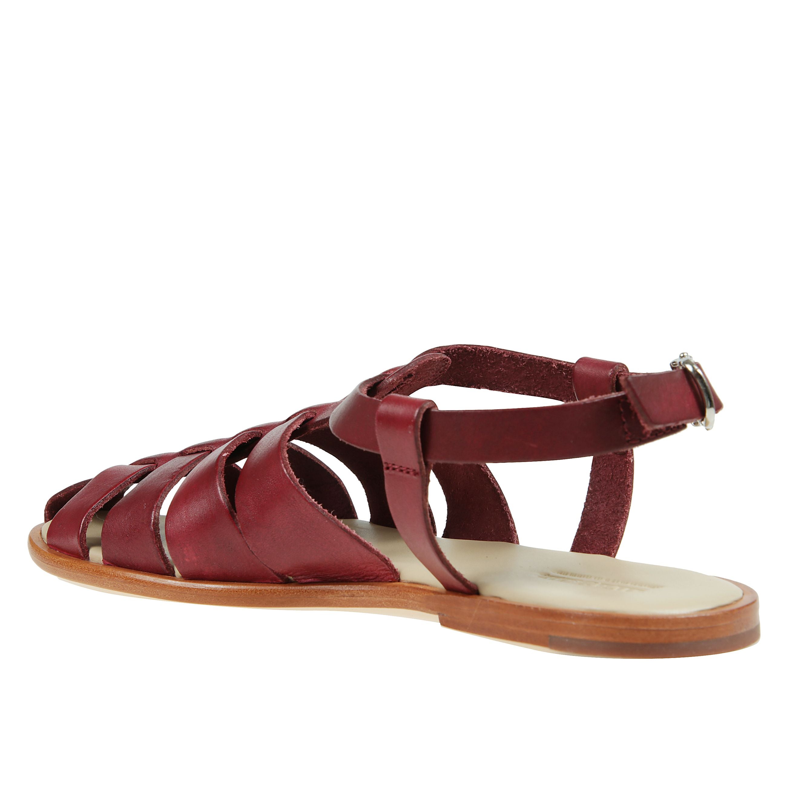 Sandali a tacco piatto da pescatore con copertura moderata intrecciata e fibbie metallica regolabili. questo articolo garantisce una produzione artigianale sviluppata in un contesto non industriale, in piccole serie. l'artigianato preserva le abilità spe