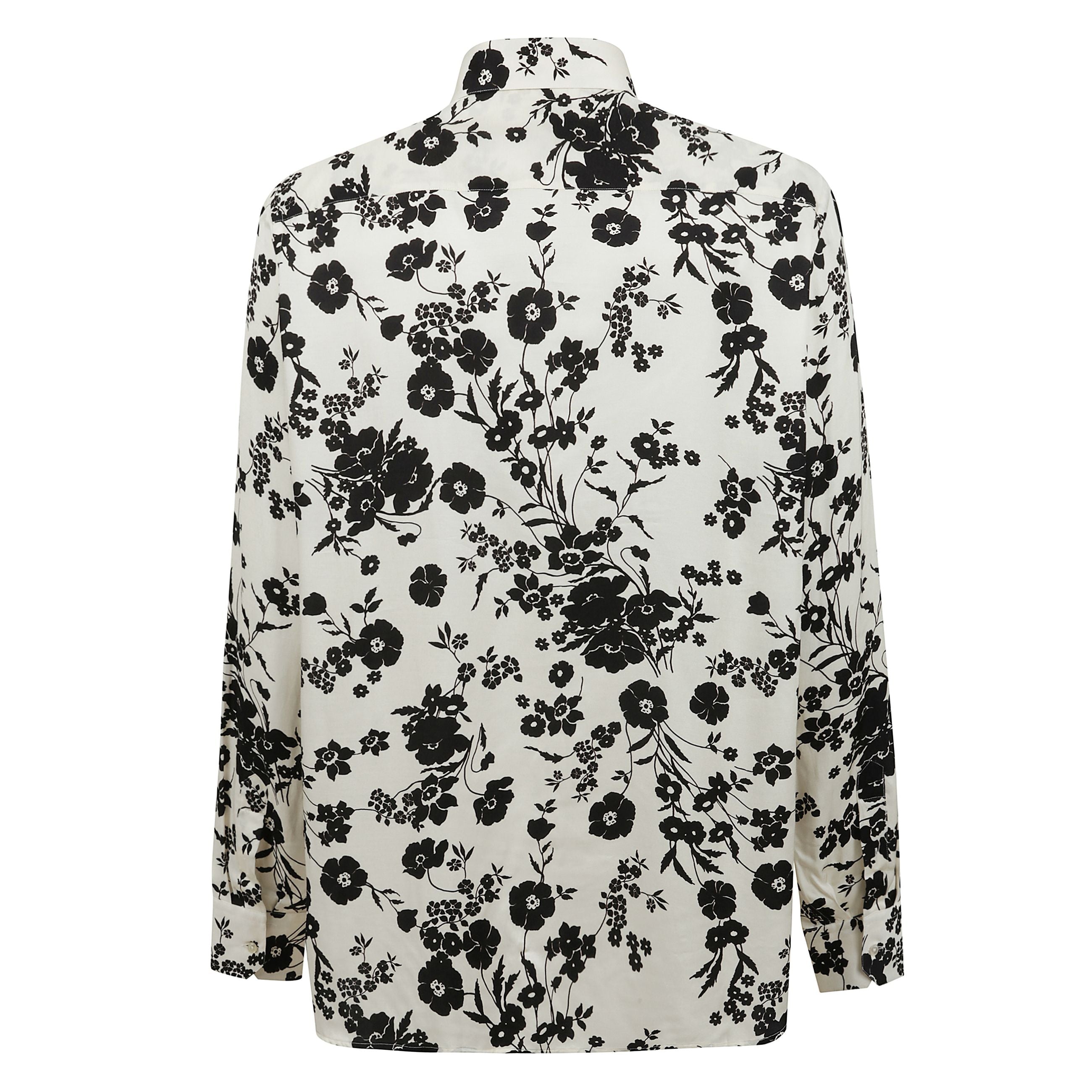 La camicia di laneus presenta una silhouette comoda con taschino a toppa sul davanti, collo all'italiana, abbottonatura nascosta e un motivo tropicale all over.