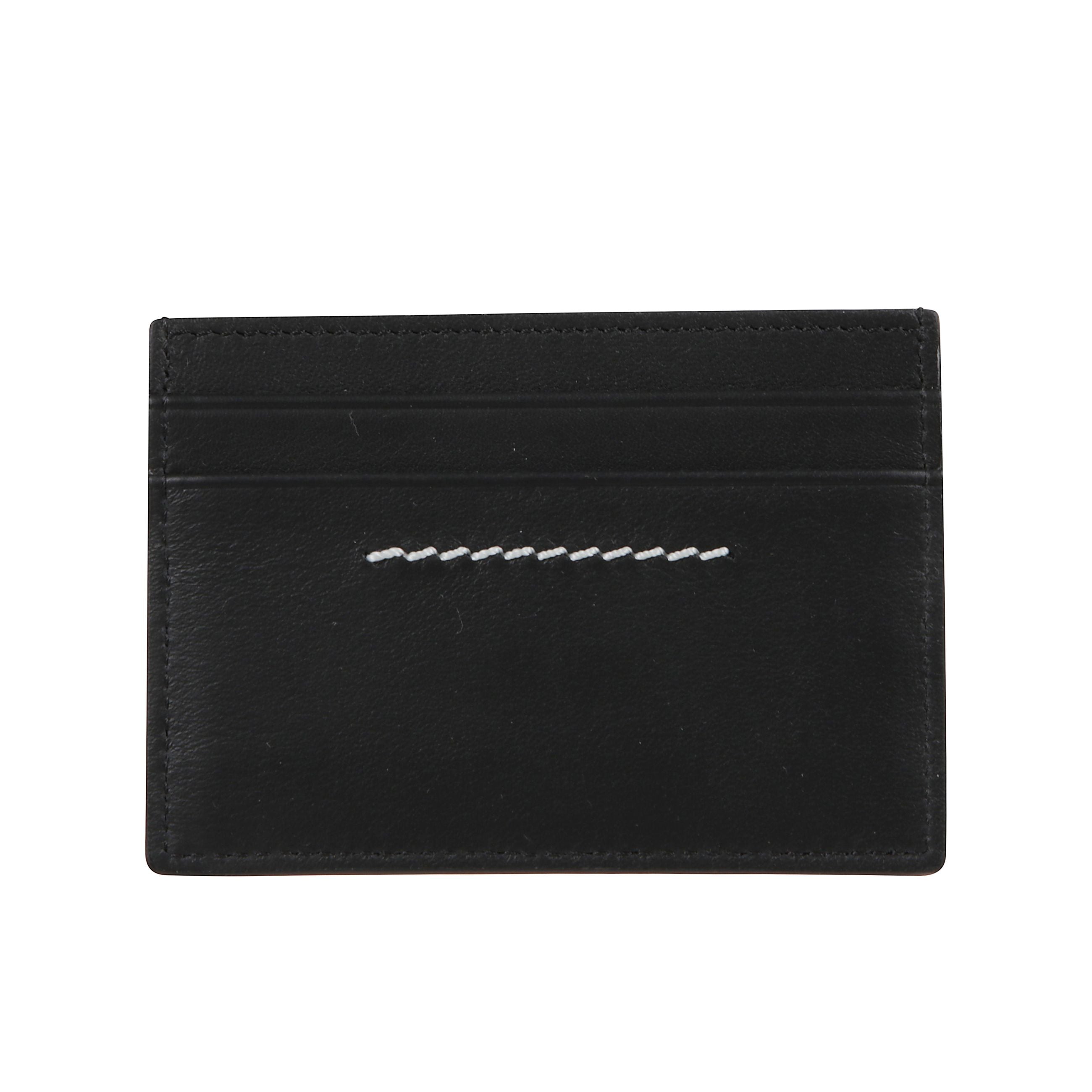 Portacarte in vera pelle. scomparti su entrambi i lati. logo maison margiela in evidenza.