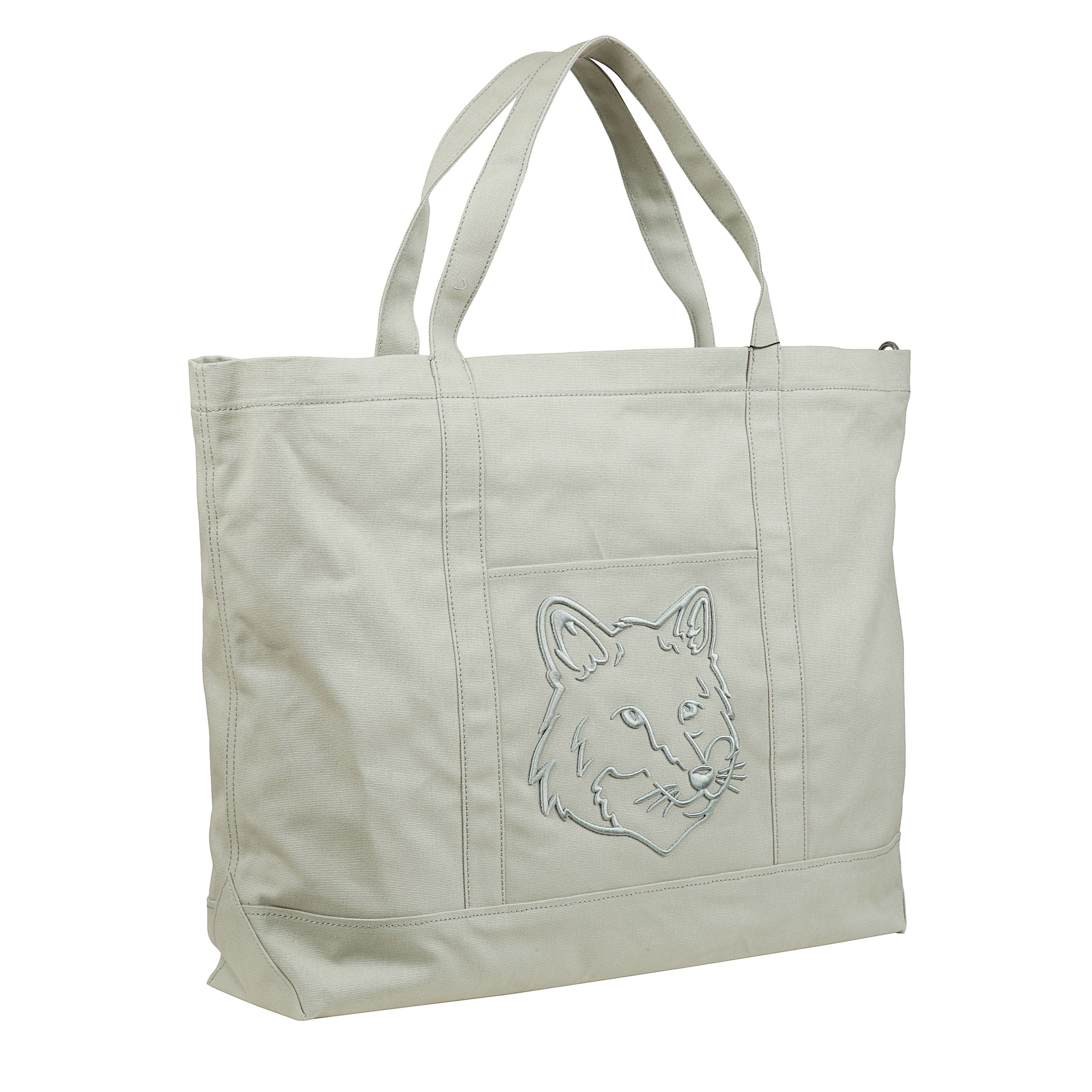 La borsa fox head grande presenta il logo testa di volpe di maison kitsuné sul retro a due manici.
