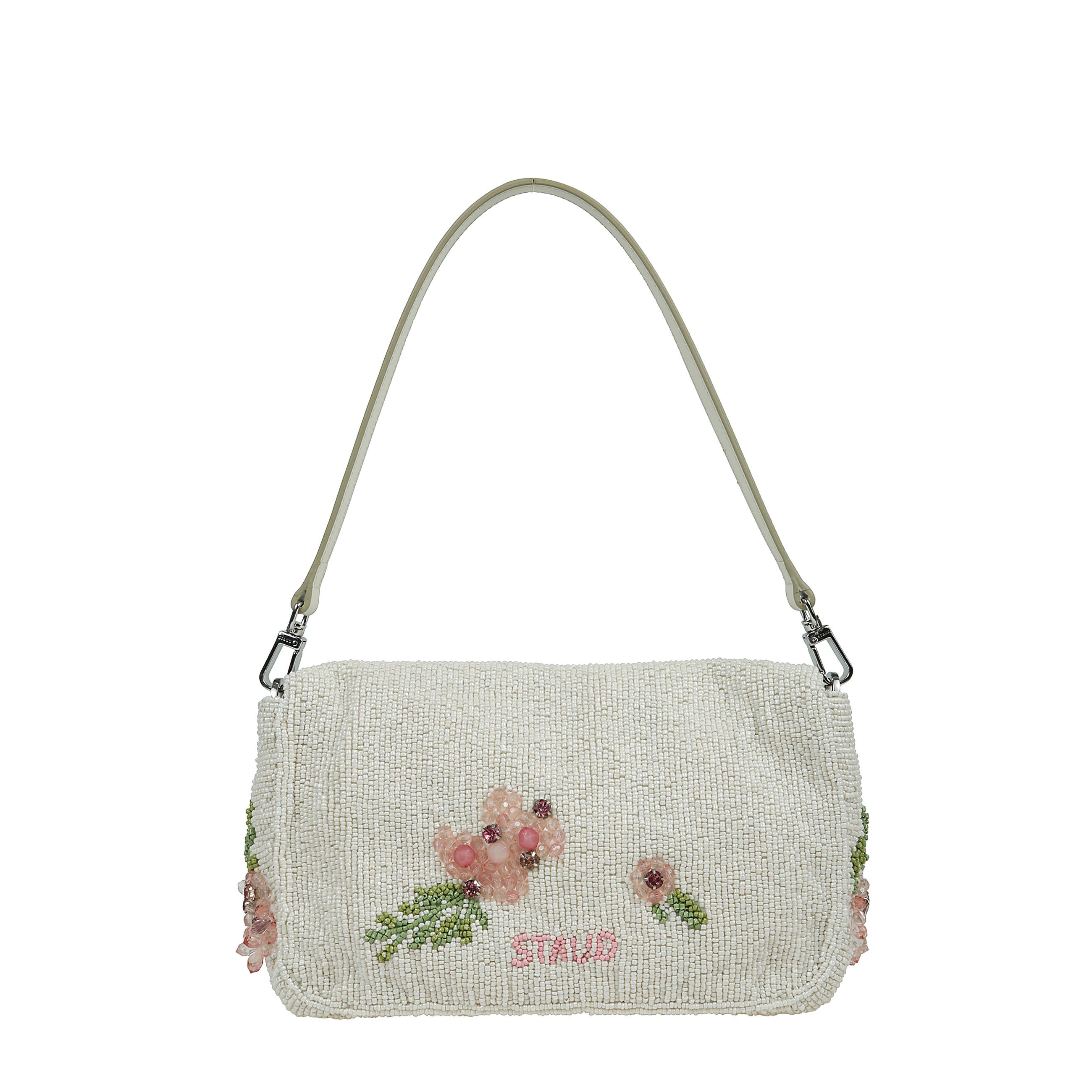 Borsa rettangolare di colore nero con battente nella parte superiore a chiusura magnetica, tracolla rimovibile, decorazione in coralli e paillette, motivo floreale.