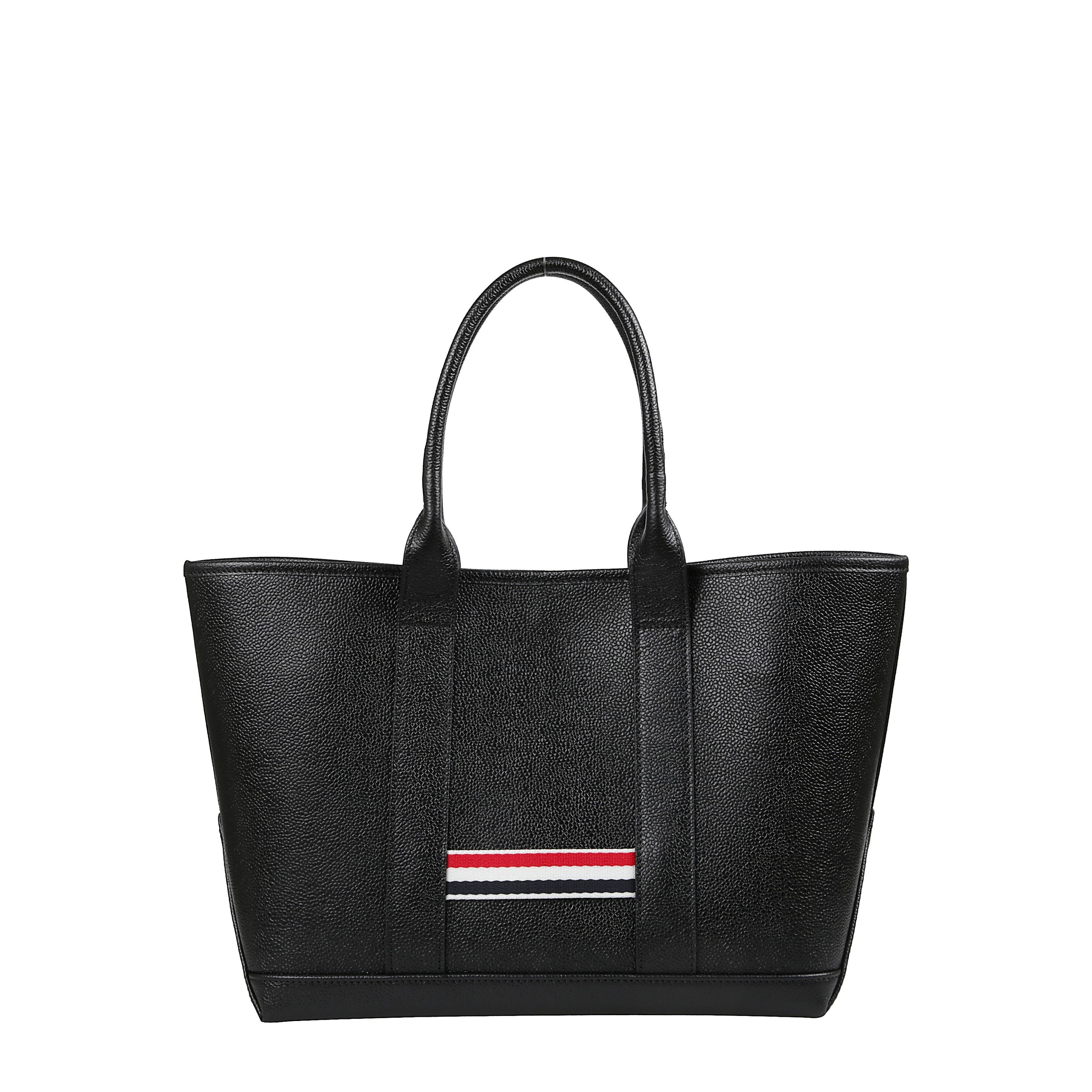 Borsa con chiusura interna e manici superiori arrotondati in pelle. dettaglio distintivo con linguetta ad anello in grosgrain a righe rosse bianche e blu.