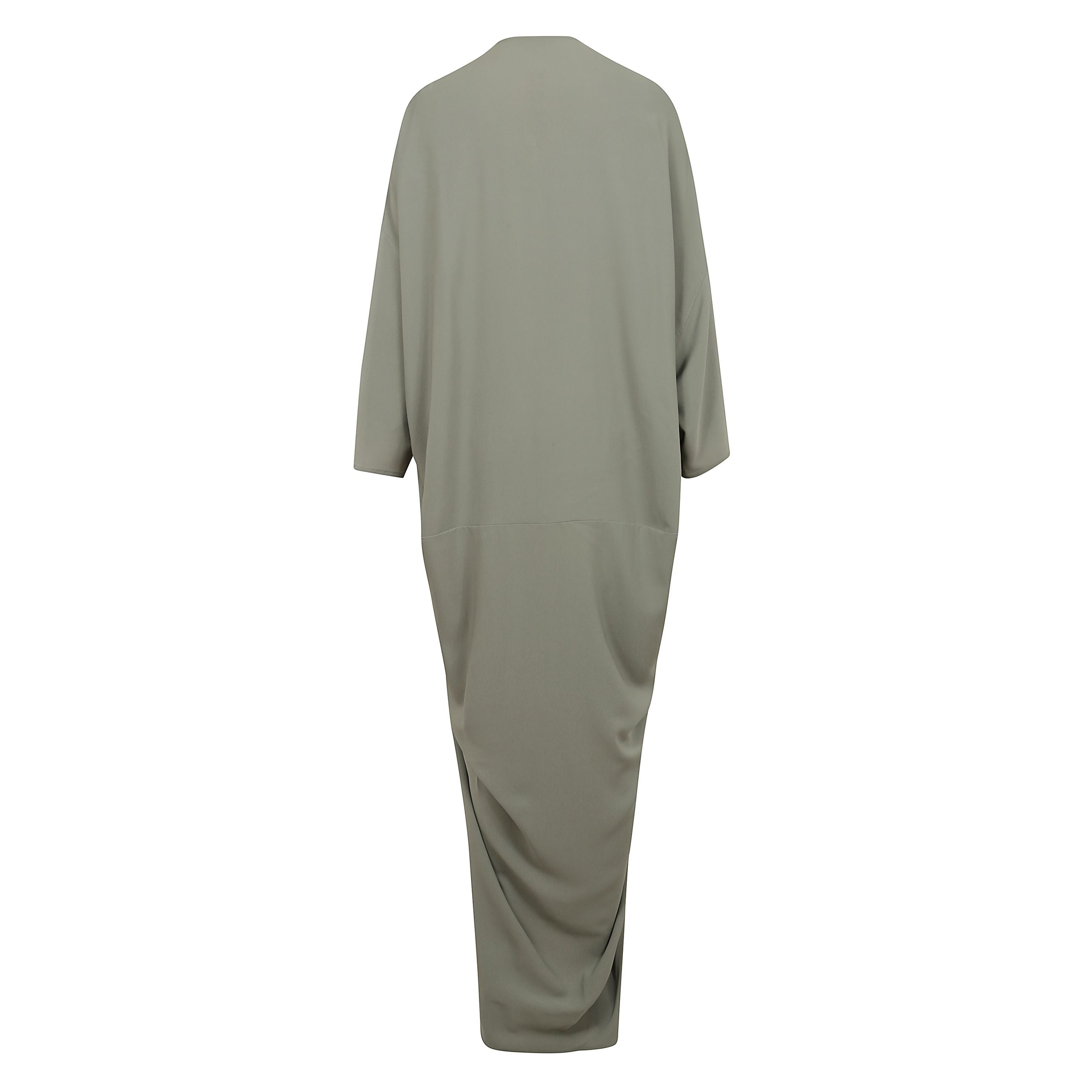 Vi presentiamo l'esclusivo abito 'tommykite' del noto designer americano rick owens. questo capolavoro, si distingue per la vestibilità lunga e allentata e l'orlo asimmetrico. le maniche larghe aggiungono un carattere rilassato alla creazione, mentre la