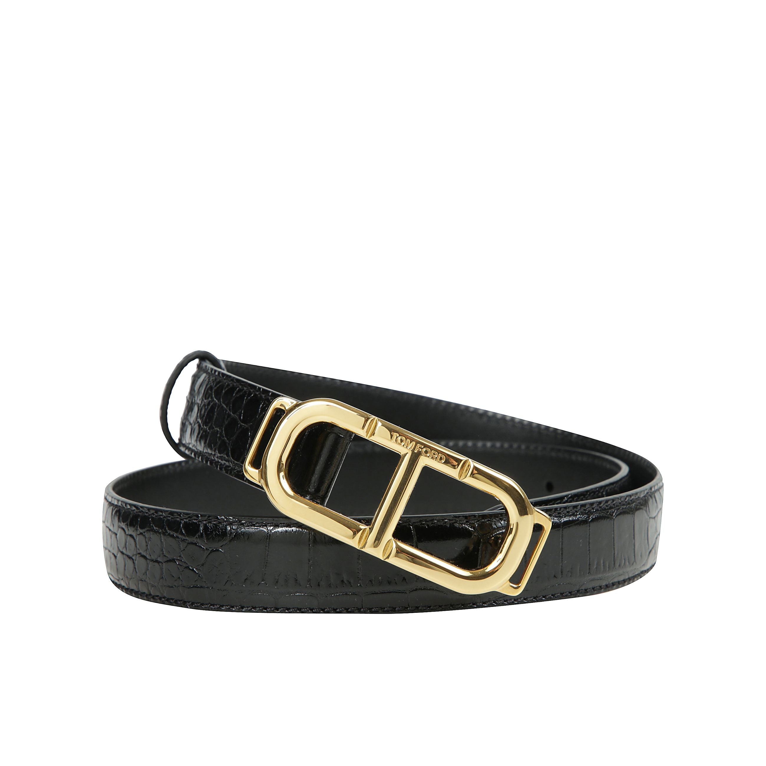 Cintura in pelle stampata con fibbia doppia t in metallo
un accessorio iconico che unisce classe, carattere e artigianalità : questa cintura firmata tom ford è realizzata in pelle nera con stampa effetto coccodrillo, dal finish lucido e sofisticato. l'el