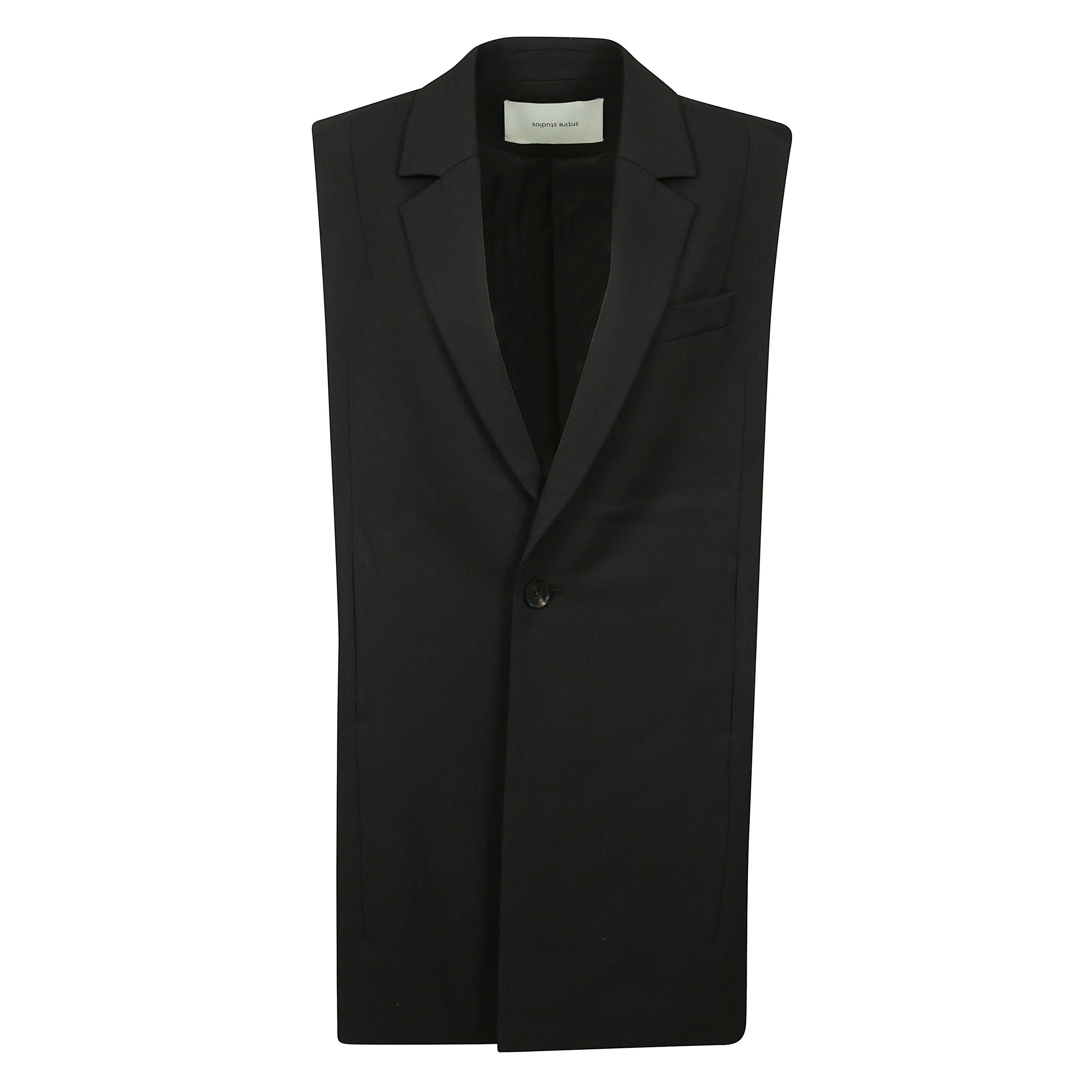 Gilet nero plateau con chiusura a bottone frontale senza maniche a due tasche laterali interne.
quando si acquista questo articolo unisex, tenere a mente che è classificato in dimensioni standard degli uomini.