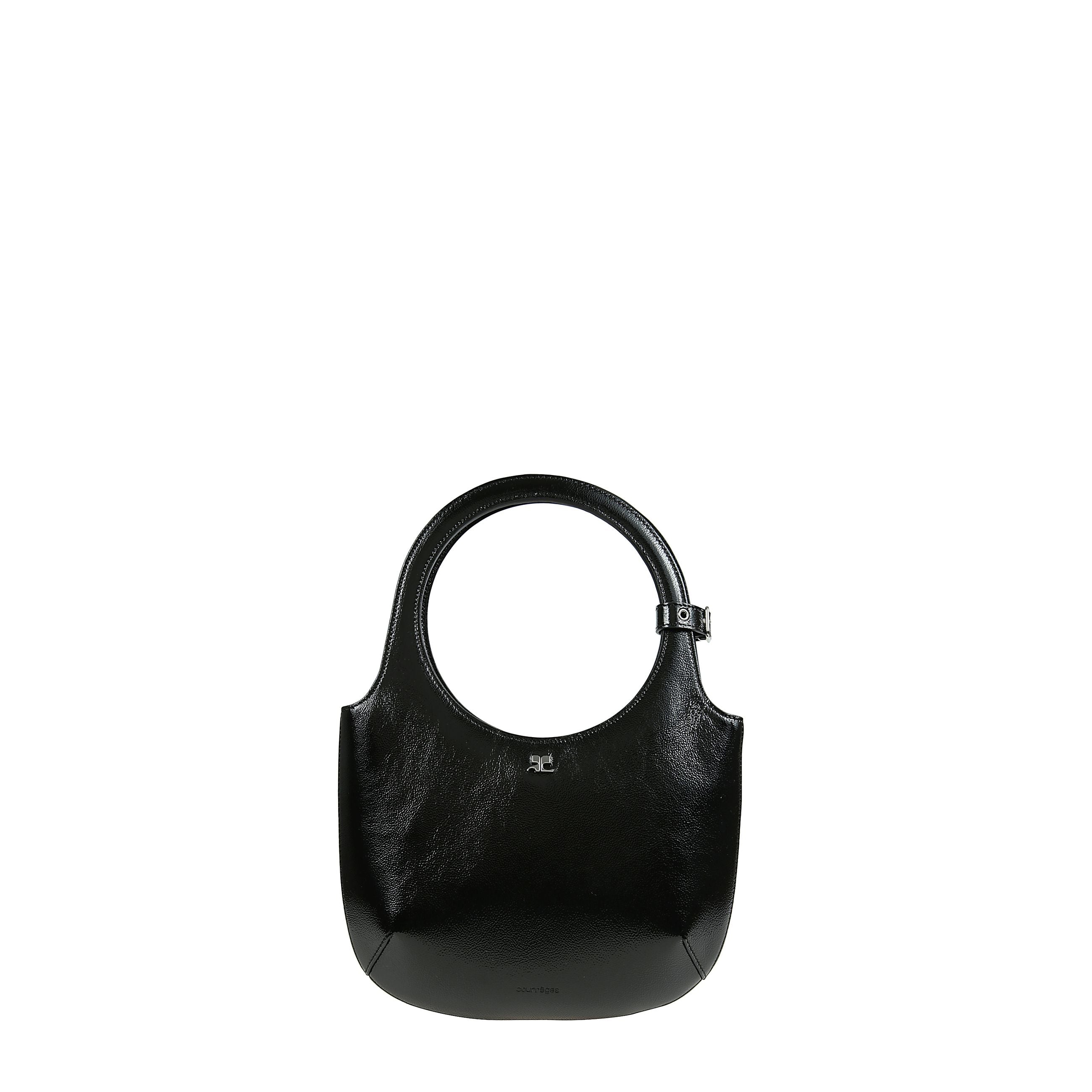 Borsa holly tracolla regolabile e rimovibile in pelle con chiusura magnetica, due manici piatti e
tasca interna applicata.