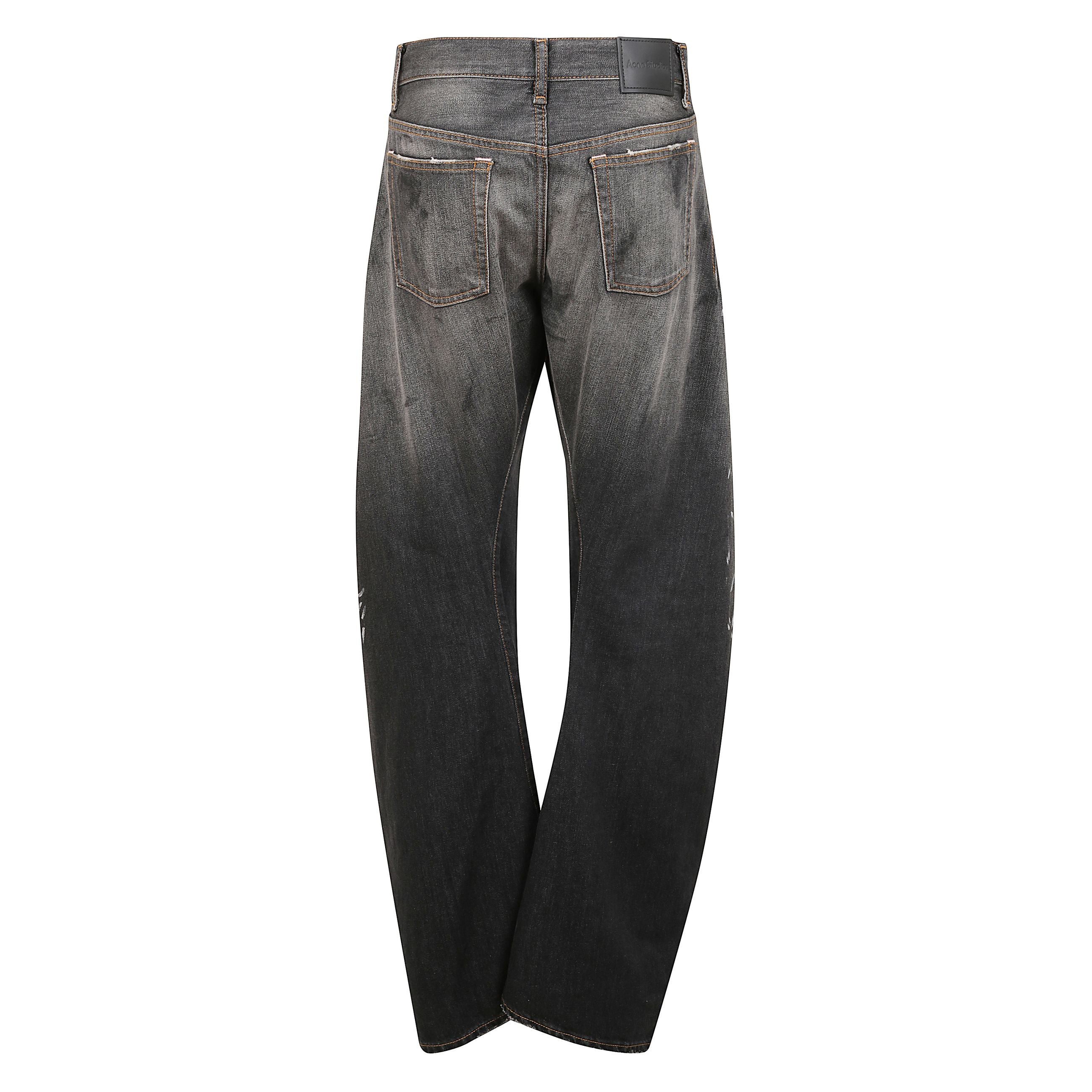 Jeans a vita alta acne studios. modello ampio a gamba dritta, con fondo leggermente svasato. dettagli di lavaggio stone washed e vissuto.