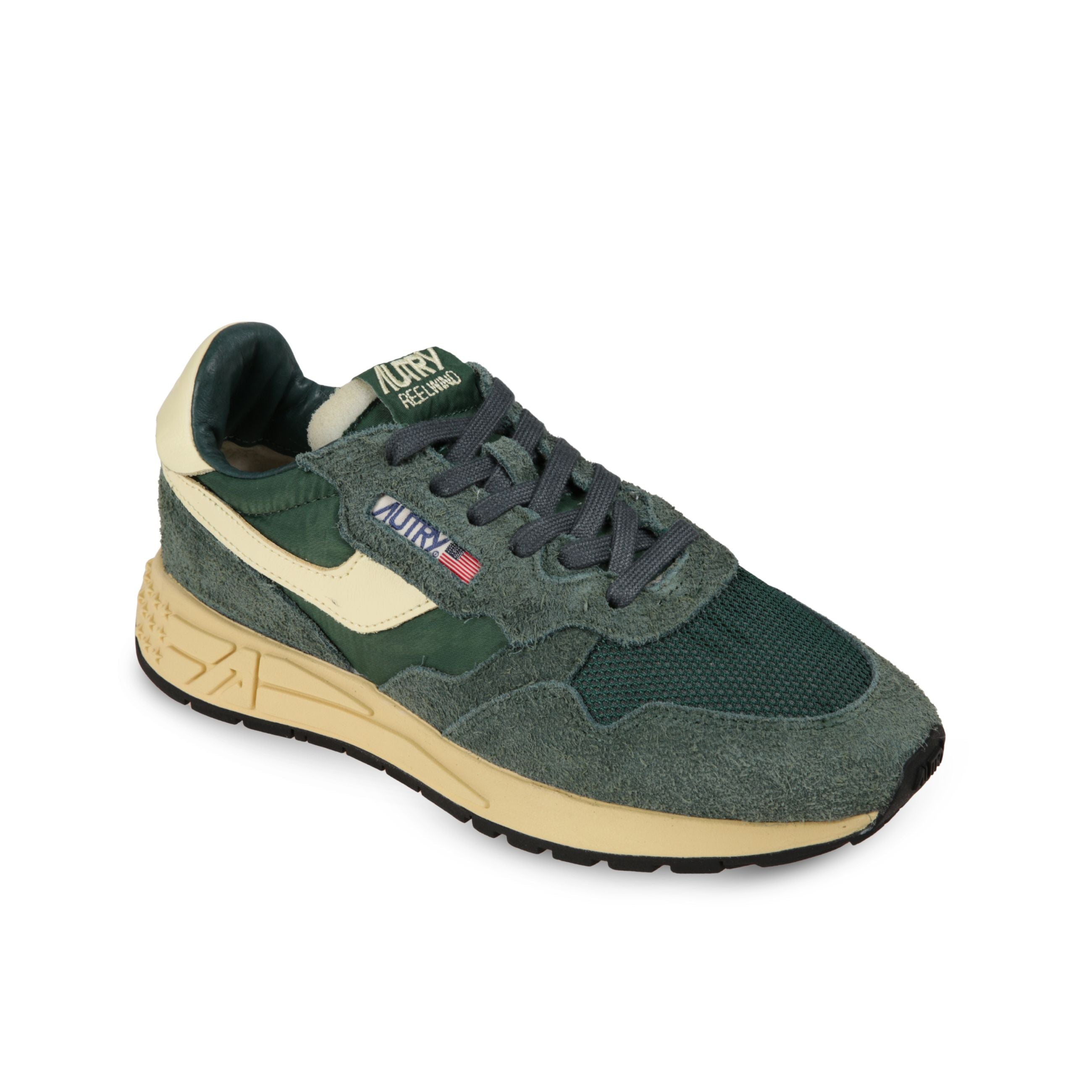 Sneakers autry reelwind. struttura in pelle e nylon con inserti in suede. talloncino ed inserti laterali in pelle con lieve effetto vintage.