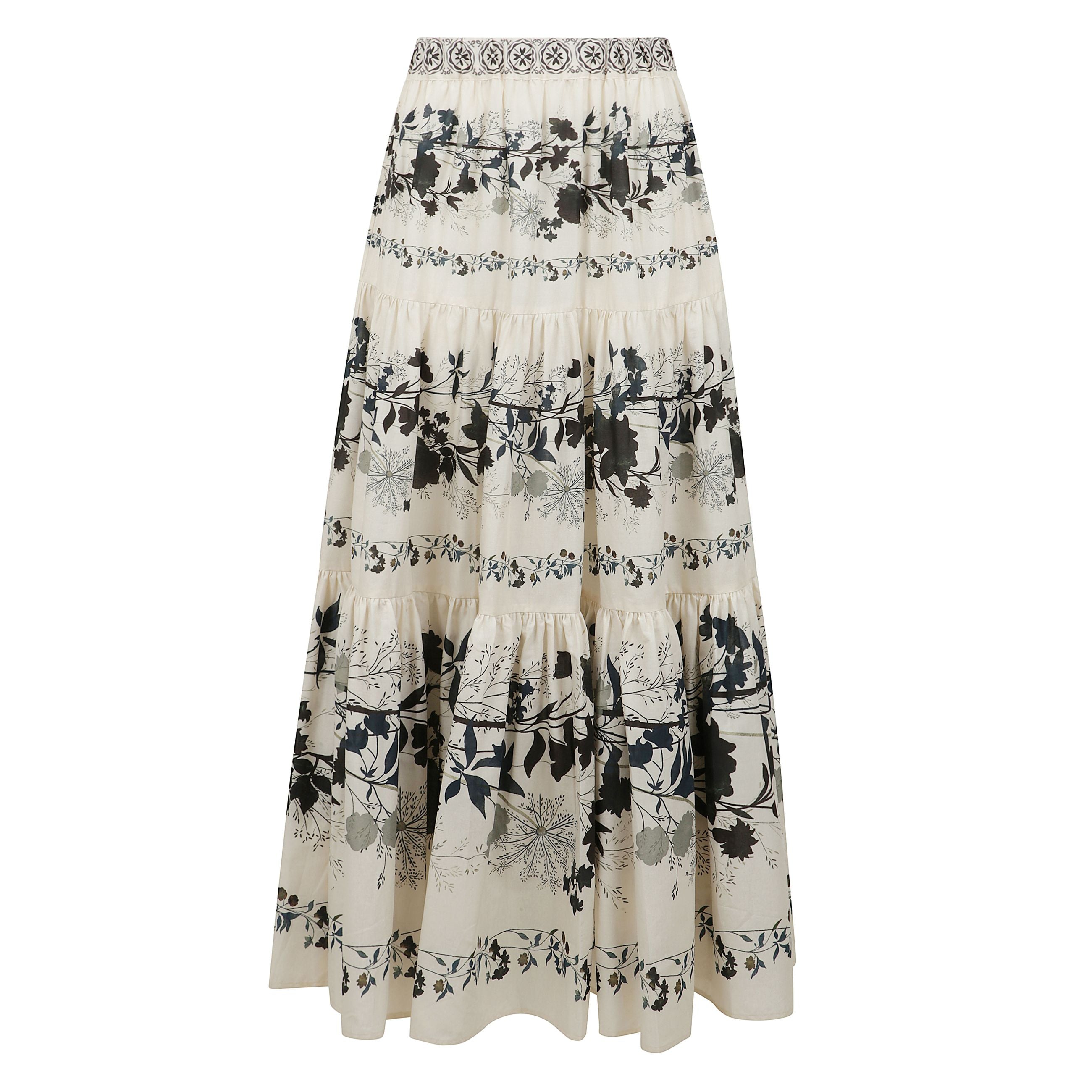 Il capo è caratterizzato dalla fresca vestibilità oversize e dalla graziosa cintura elastica.