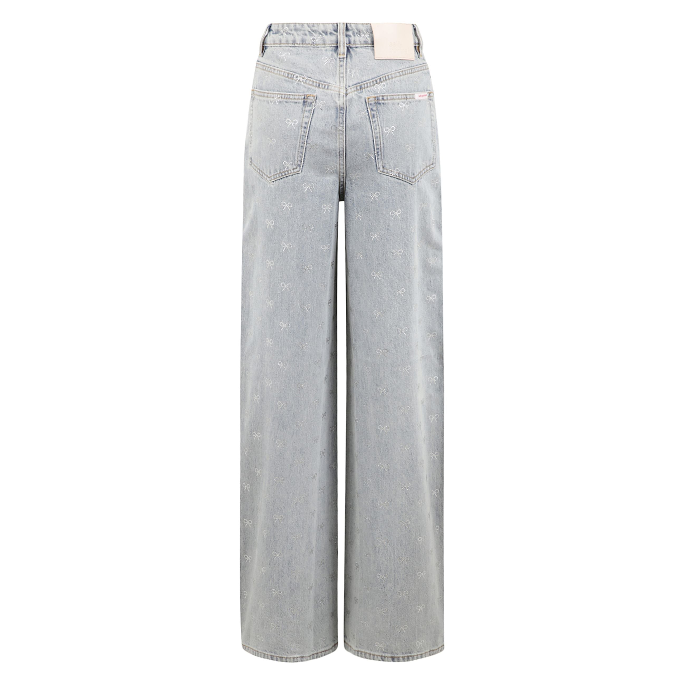 Jeans a vita alta taglio slim. chiusura frontale con zip e bottone. passanti per cintura. tasche a taglio anteriori e posteriori. decorazioni a forma di fiocco metallizzate all-over.