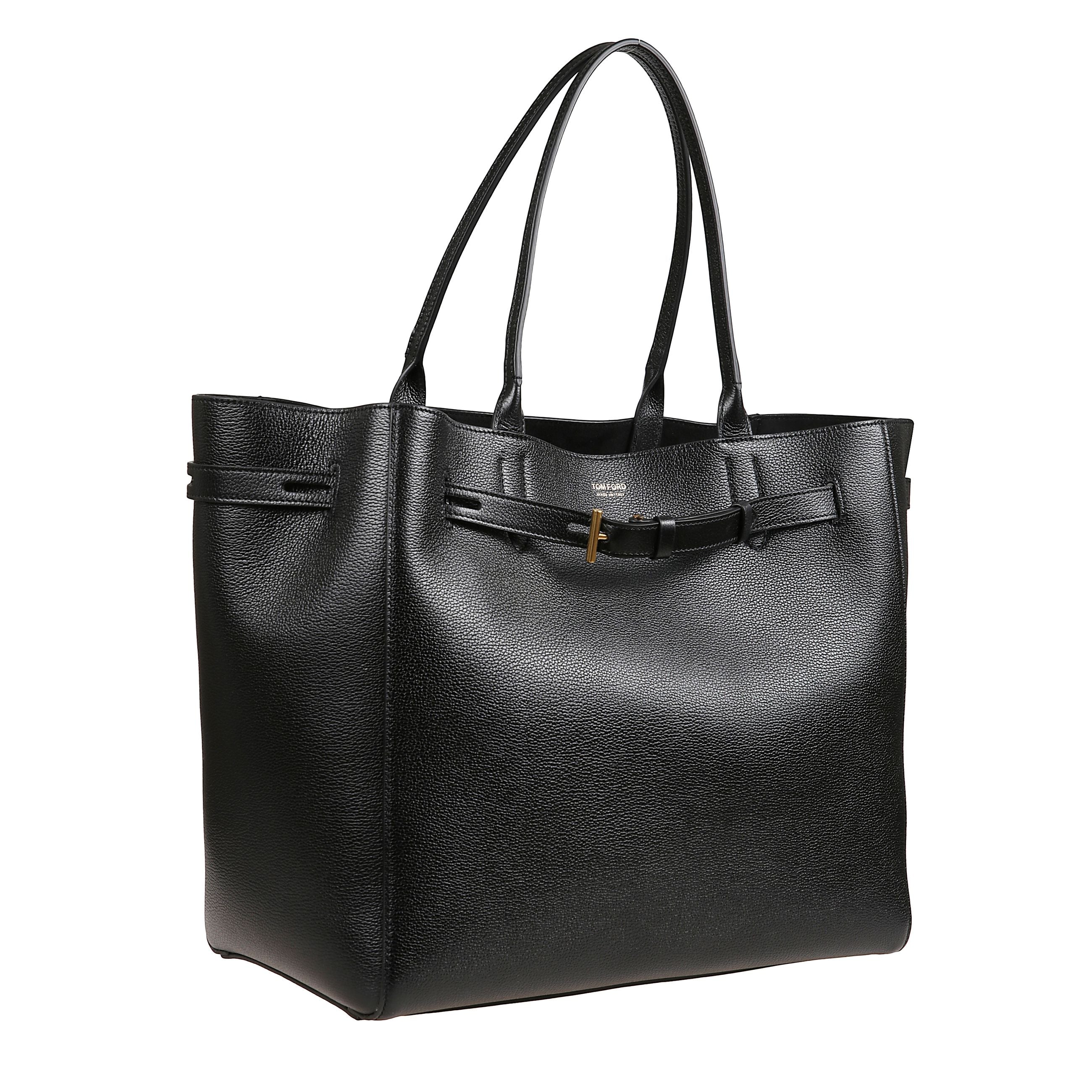 Borsa tote audrey large in pelle martellata nera con dettaglio metallico a t e cintura in pelle regolabile per modulare la forma. interno con ampio scomparto e tasca con zip, fodera in microfibra morbida.