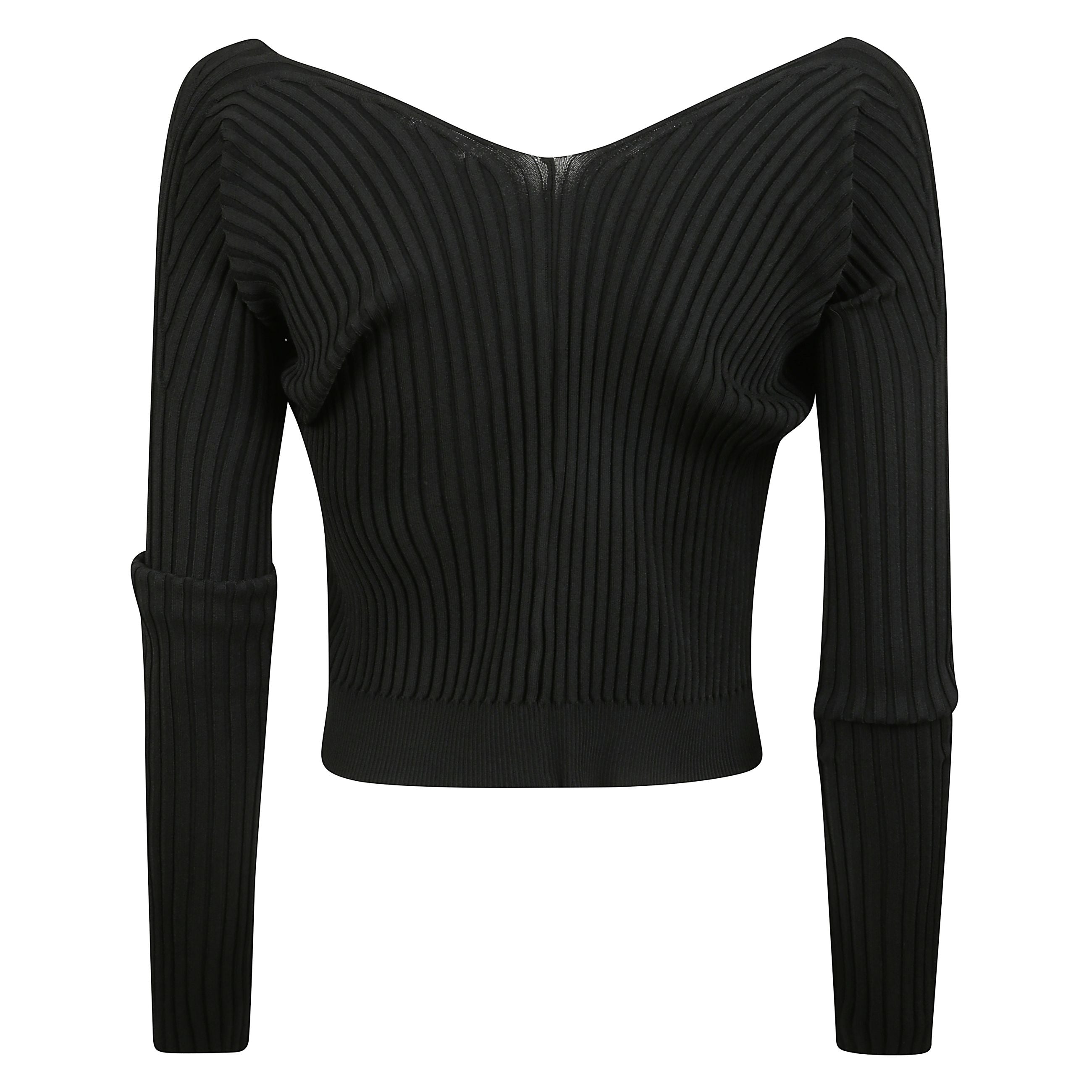 Cardigan senza cuciture con taglio dritto, maniche lunghe aderenti e un charm jacquemus cucito in metallo dorato.