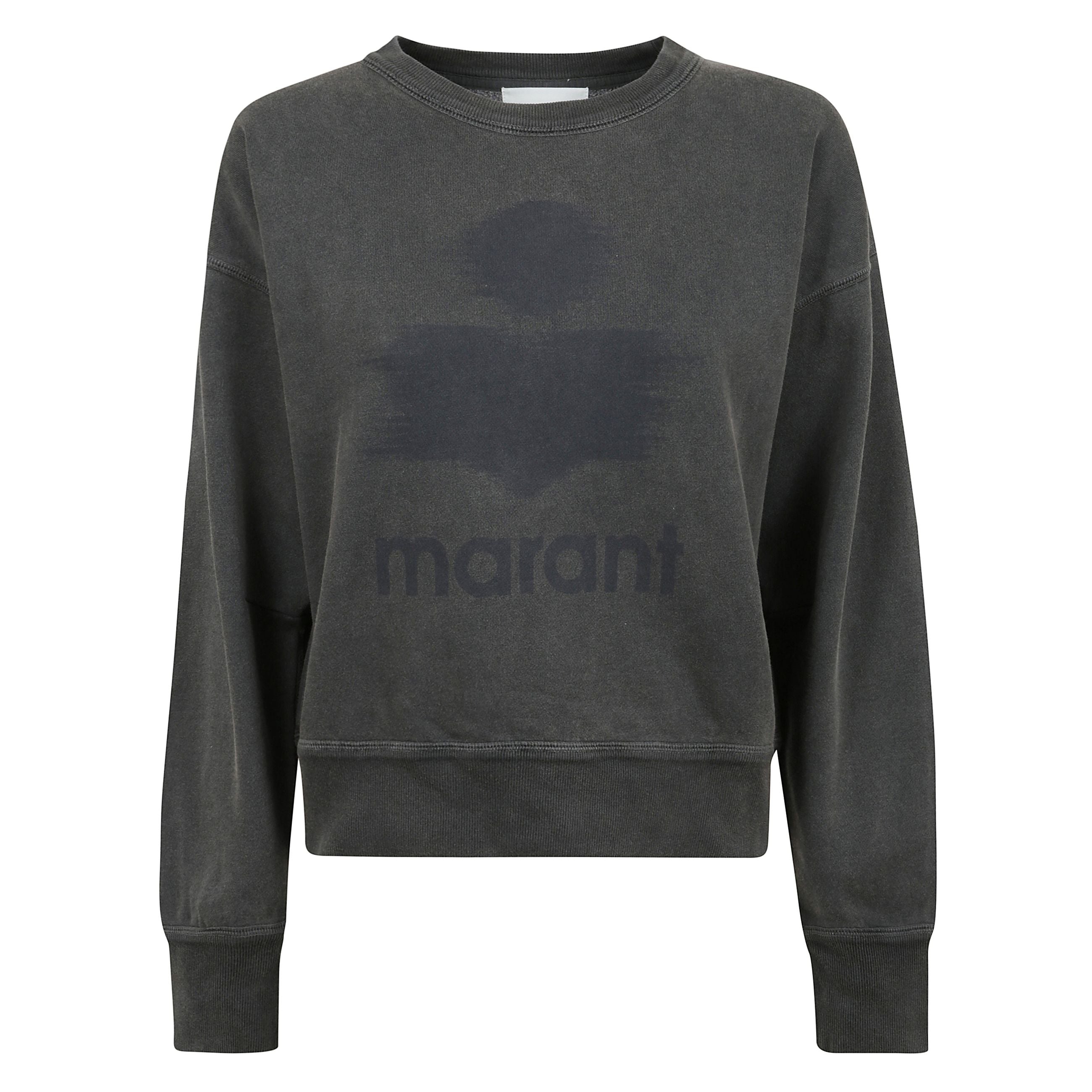 Mobyli-ga felpa è realizzata in cotone con interno spazzolato, scollo rotondo, spalle scese e maniche lunghe con polsini a coste. il logo "marant" sfocato è stampato sul davanti, mentre le finiture a coste completano il design.