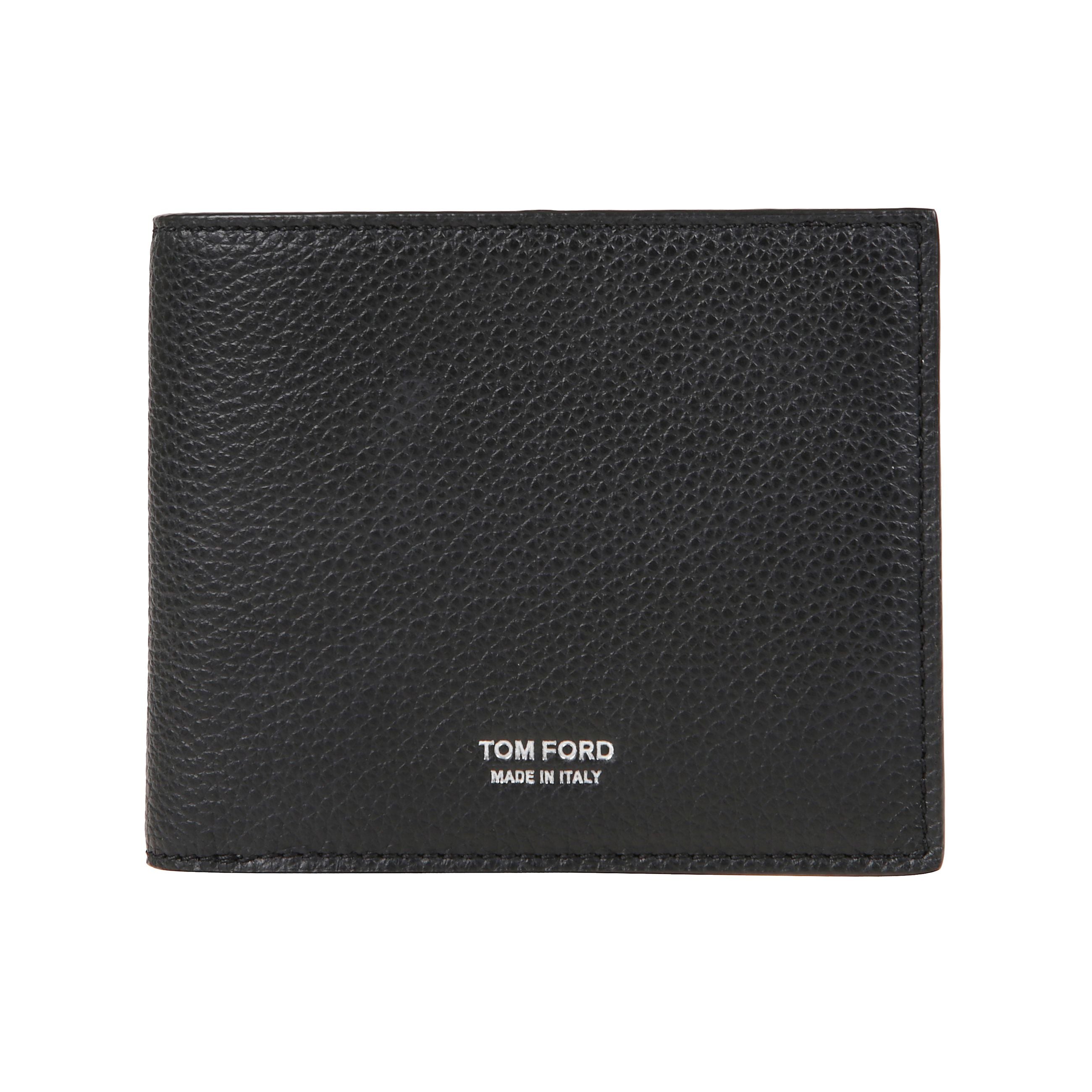 Portacarte in pelle. slot multipli per schede e vano centrale. dimensioni compatte. logo tom ford sulla parte frontale.