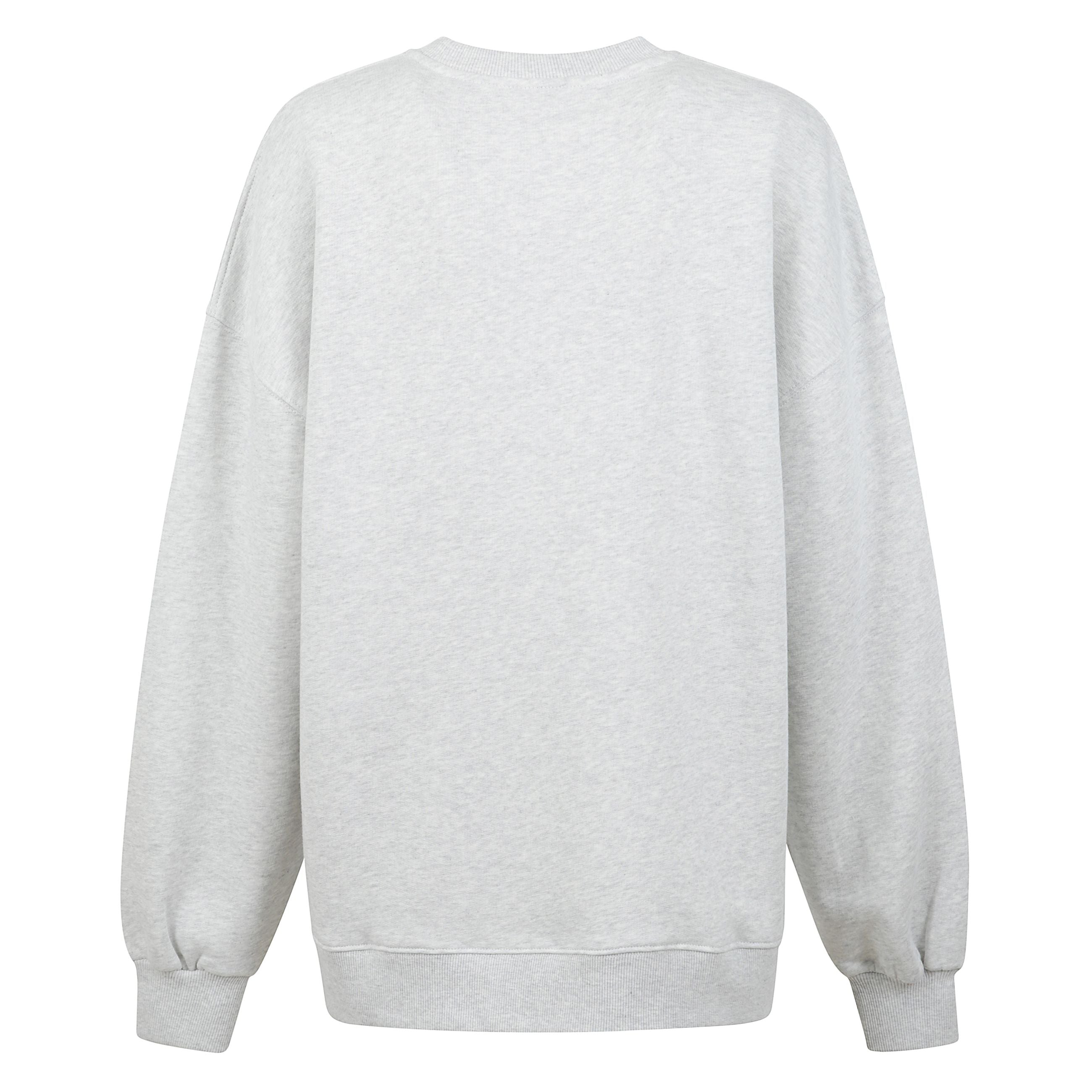 Felpa oversize in cotone leggermente elasticizzato con interno felpato. girocollo classico, spalle raglan e finiture a costine su polsi e orlo con cordino elastico. il maxi logo ricamato sul fronte definisce un design essenziale dal carattere deciso.