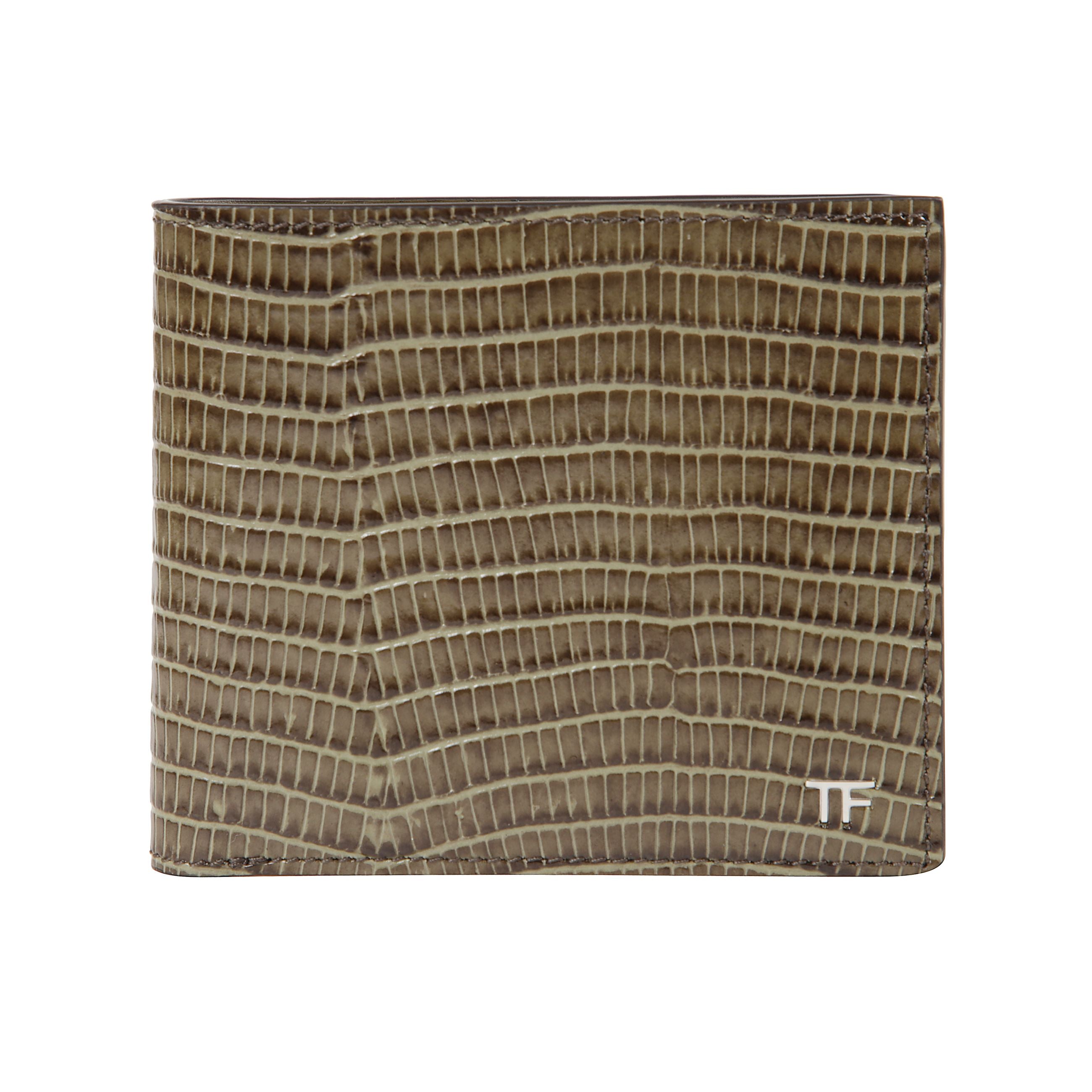 Portafoglio in pelle naturale. esterno con trama effetto coccodrillo. interno liscio in tinta marrone. logo tom ford in metallo applicato sull’angolo anteriore. profilo ultra-sottile.