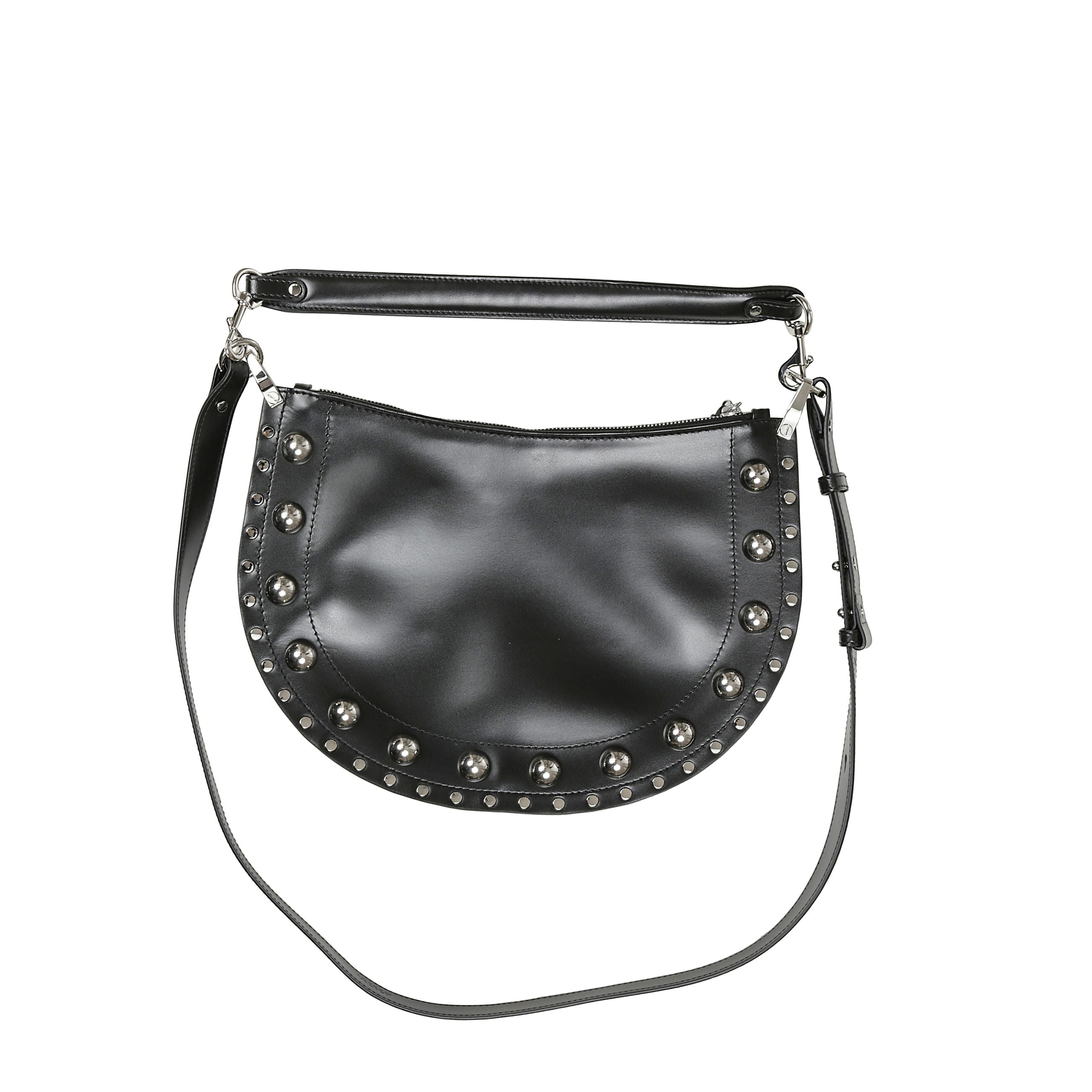 Borsa in pelle di vacchetta liscia borchiata. da portare a mano, a spalla o a tracolla cn manico rimovibile a moschettoni di 34cm.
tracolla regolabile con bottoni a perno
anelli in metallo inciso. bordo ornato da borchie metalliche e chiusura a zip con ti