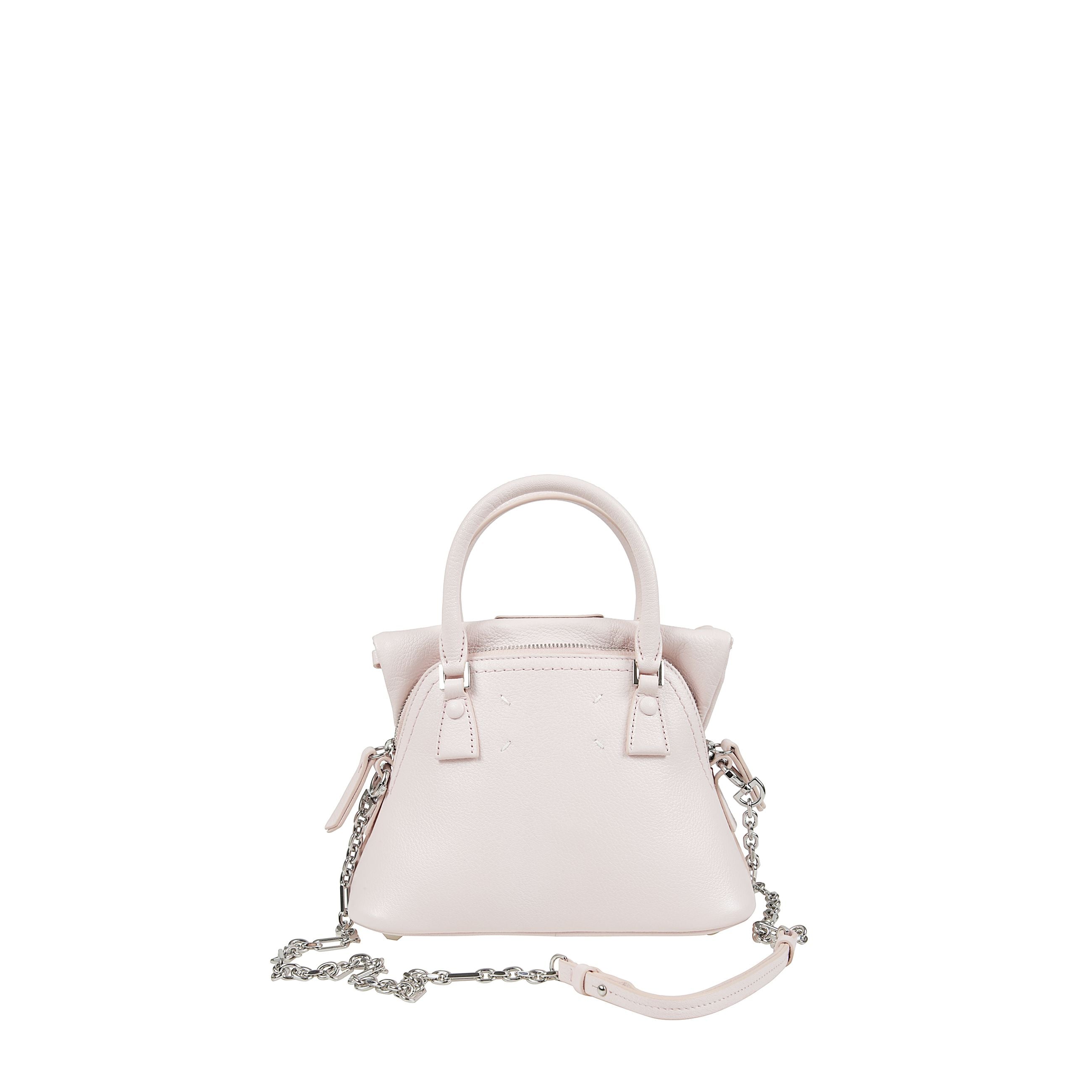 Borsa tote 5ac classique mini in pelle di vitello martellata, due manici tondi, tracolla rimovibile con catena, chiusura superiore con zip e scomparto unico.