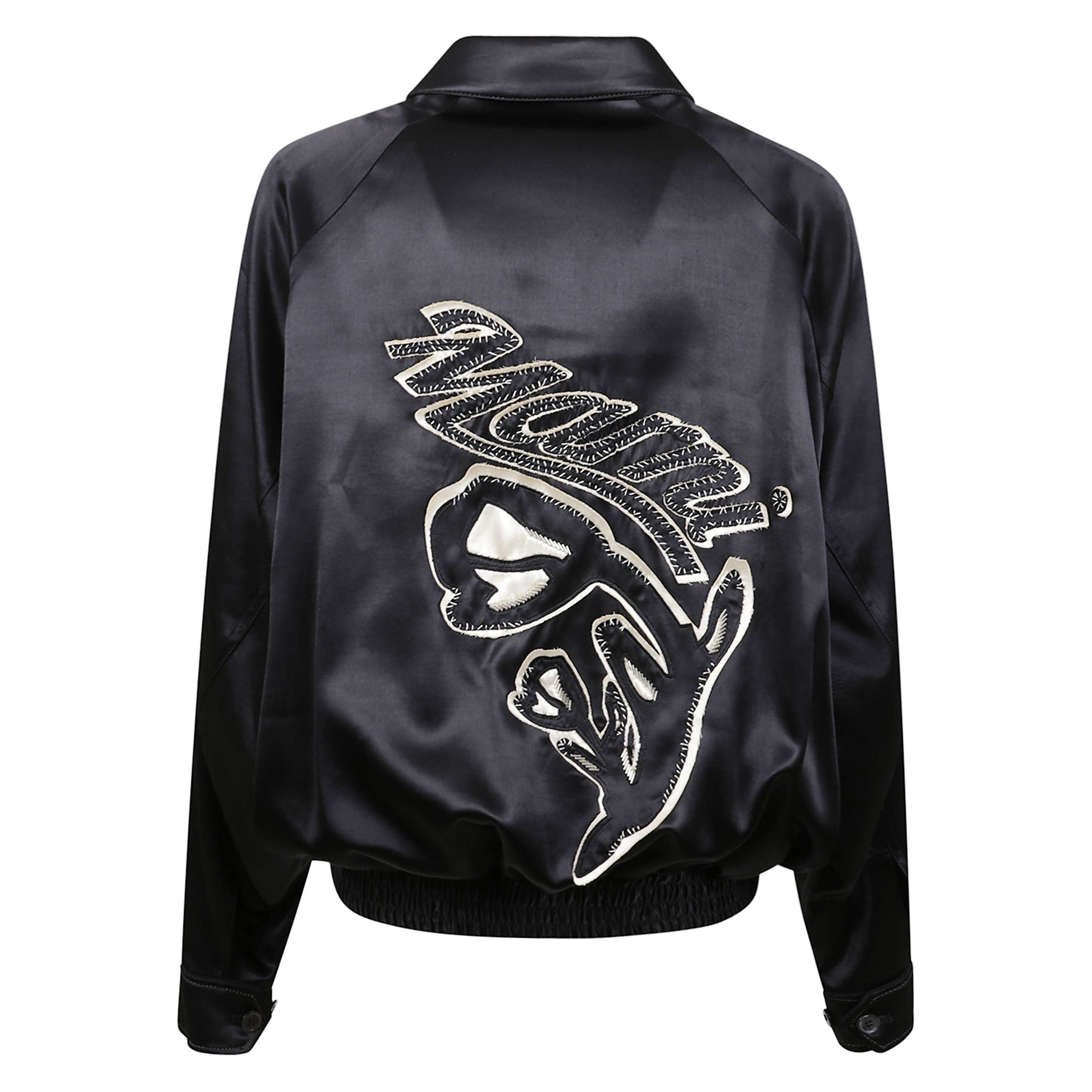 Giacca con colletto classico e ampie tasche laterali, dal taglio ampio e leggermente oversize. spalle scese e maniche dritte. chiusura con zip argentata. polsino elasticizzato sull'orlo inferiore. retro con decorazione a firma marni cucita.