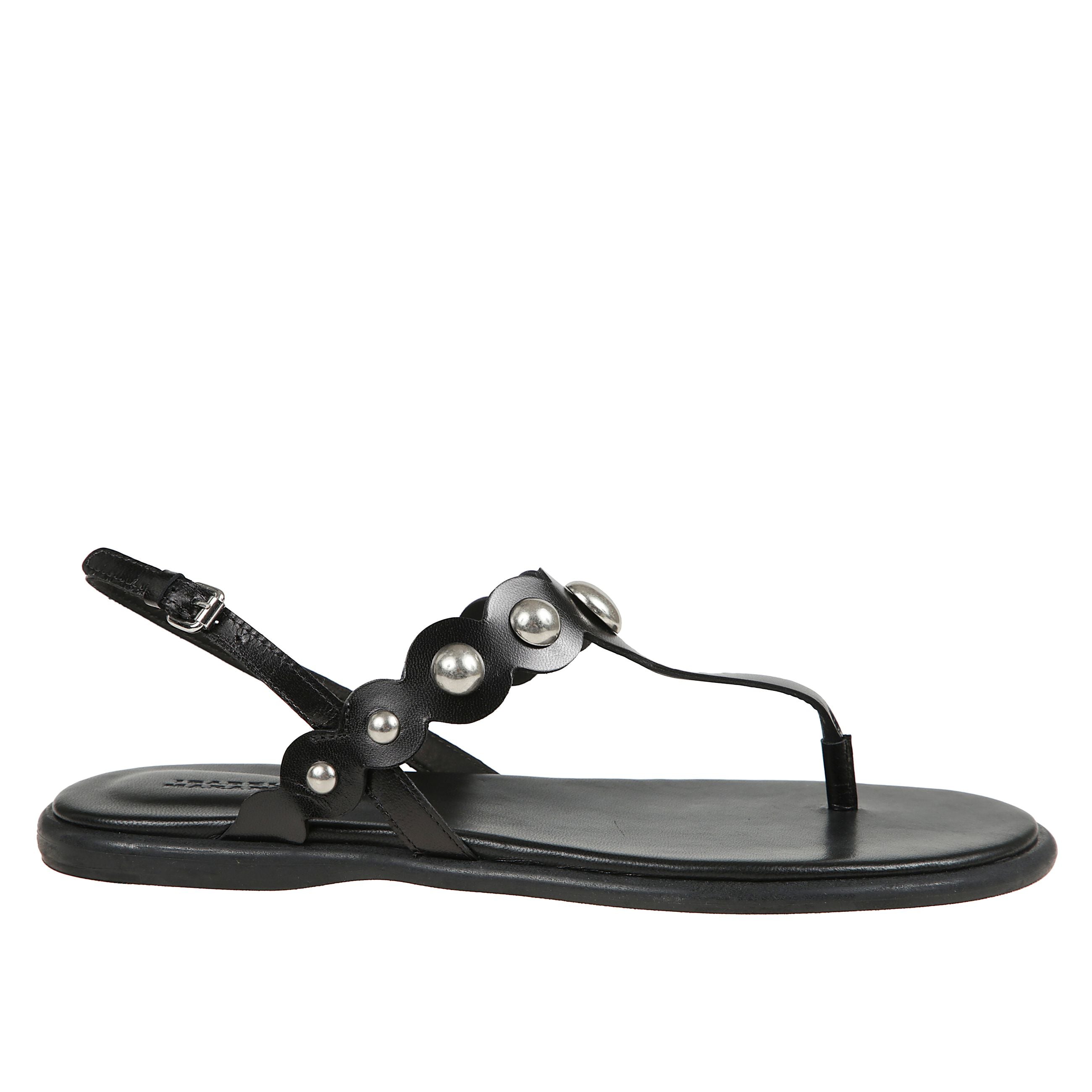 Nya sandali a punta piatta.