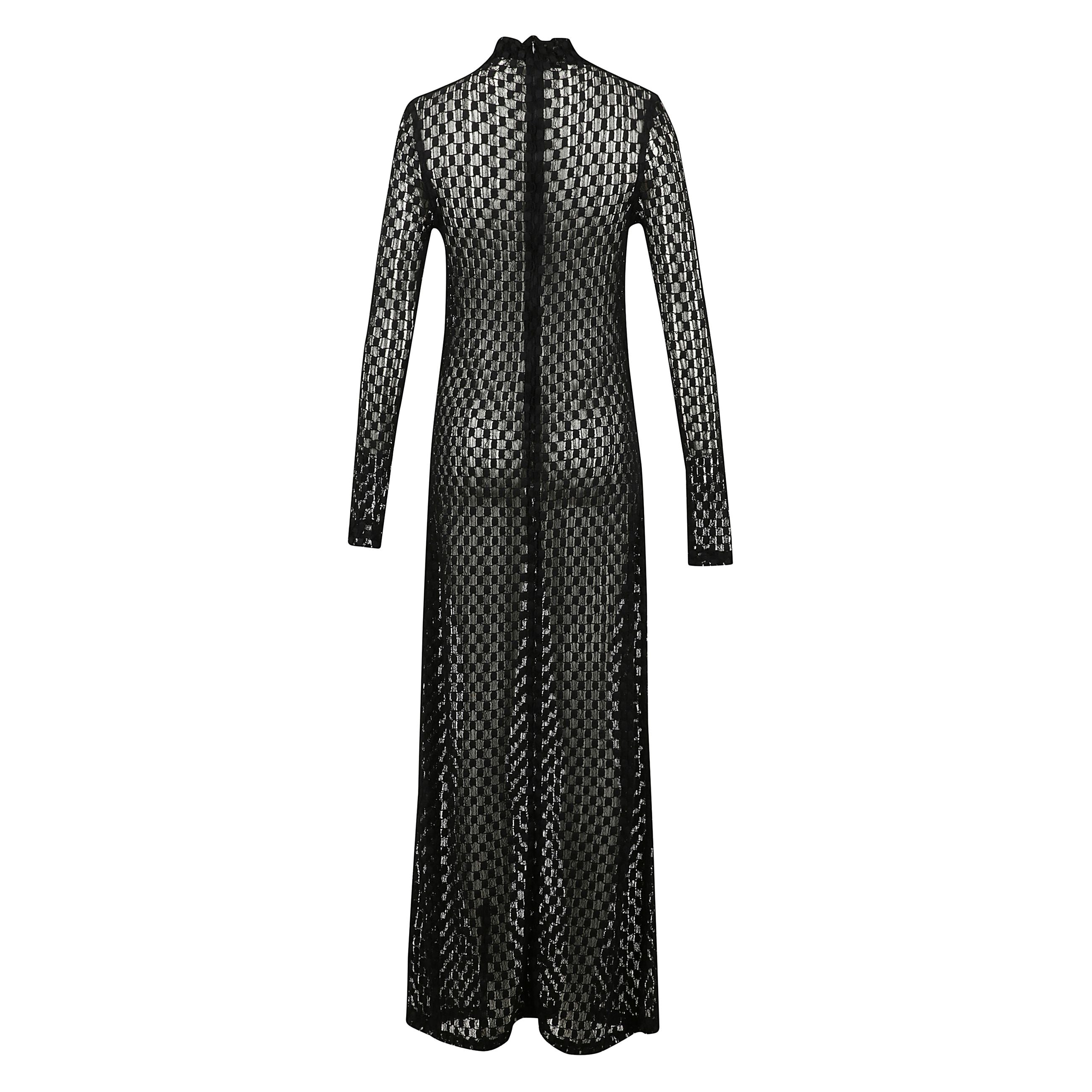 Abito dolcevita lungo , realizzato in un elegante pizzo dal design geometrico, aderente e semitrasparente