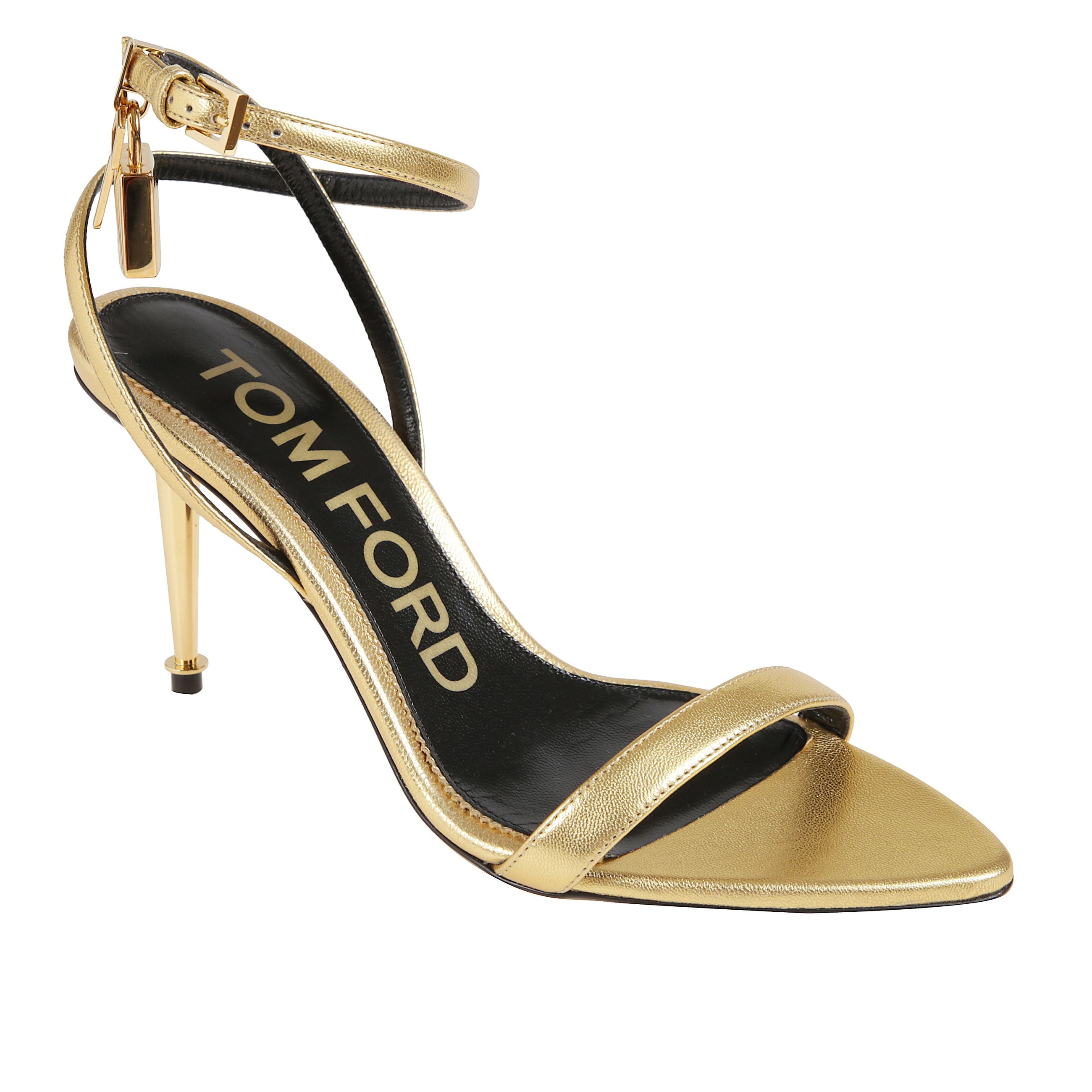 Décolleté in pelle con punta affusolata. cinturino alla caviglia regolabile e tacco a spillo in metallo. interno e soletta con firma tom ford impressa. dettaglio iconico con lucchetto metallico sul cinturino.