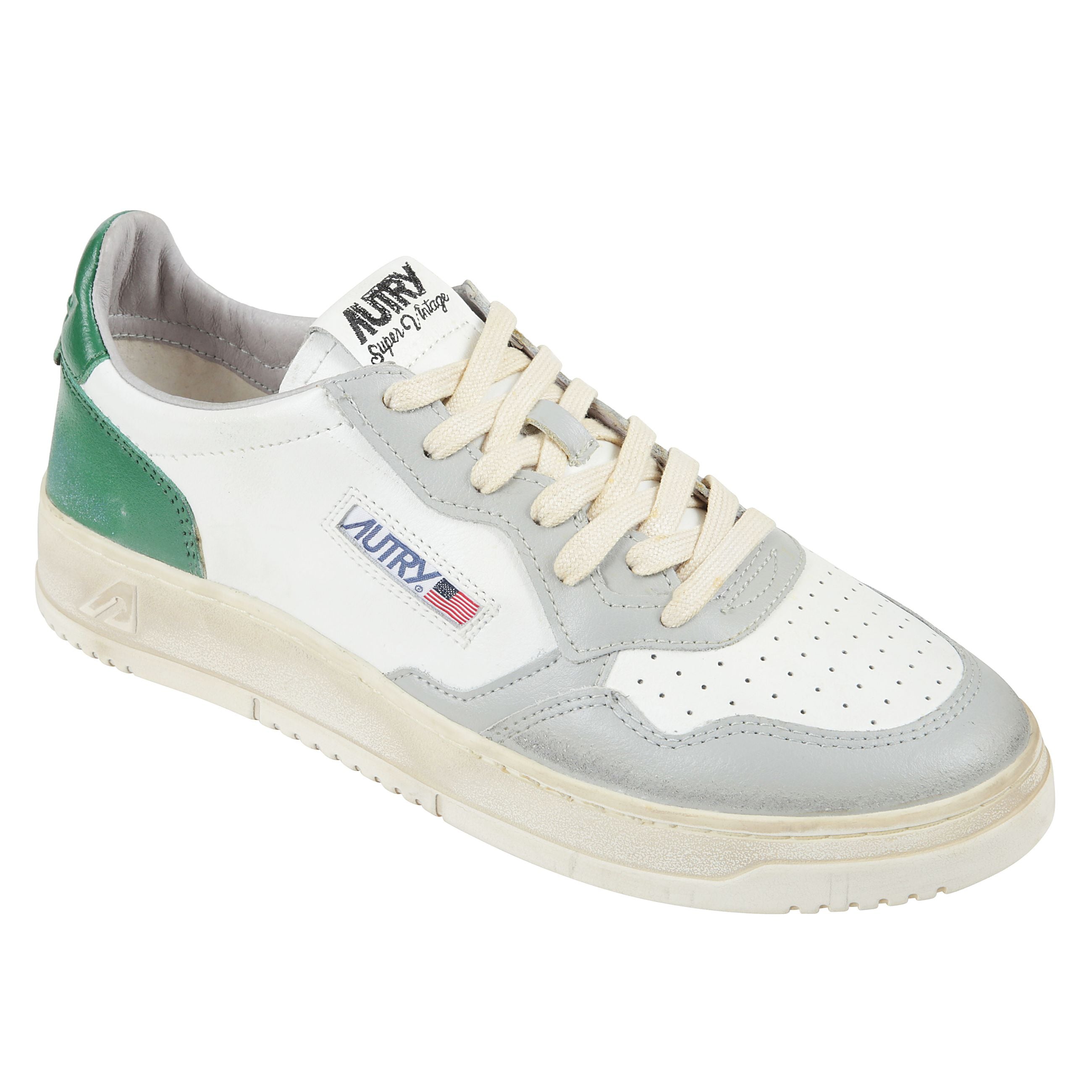 Sneaker stringata super vintage in pelle con suola in gomma