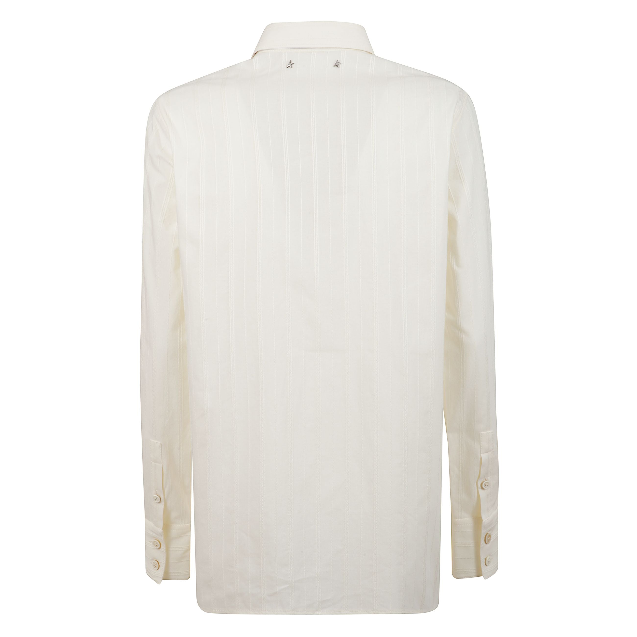 Camicia in cotone panna con righe verticali in rilievo e ricamo floreale arricchito da paillettes bianche. presenta chiusura con bottoni e due stelline decorative sul retro. fa parte della journey collection.