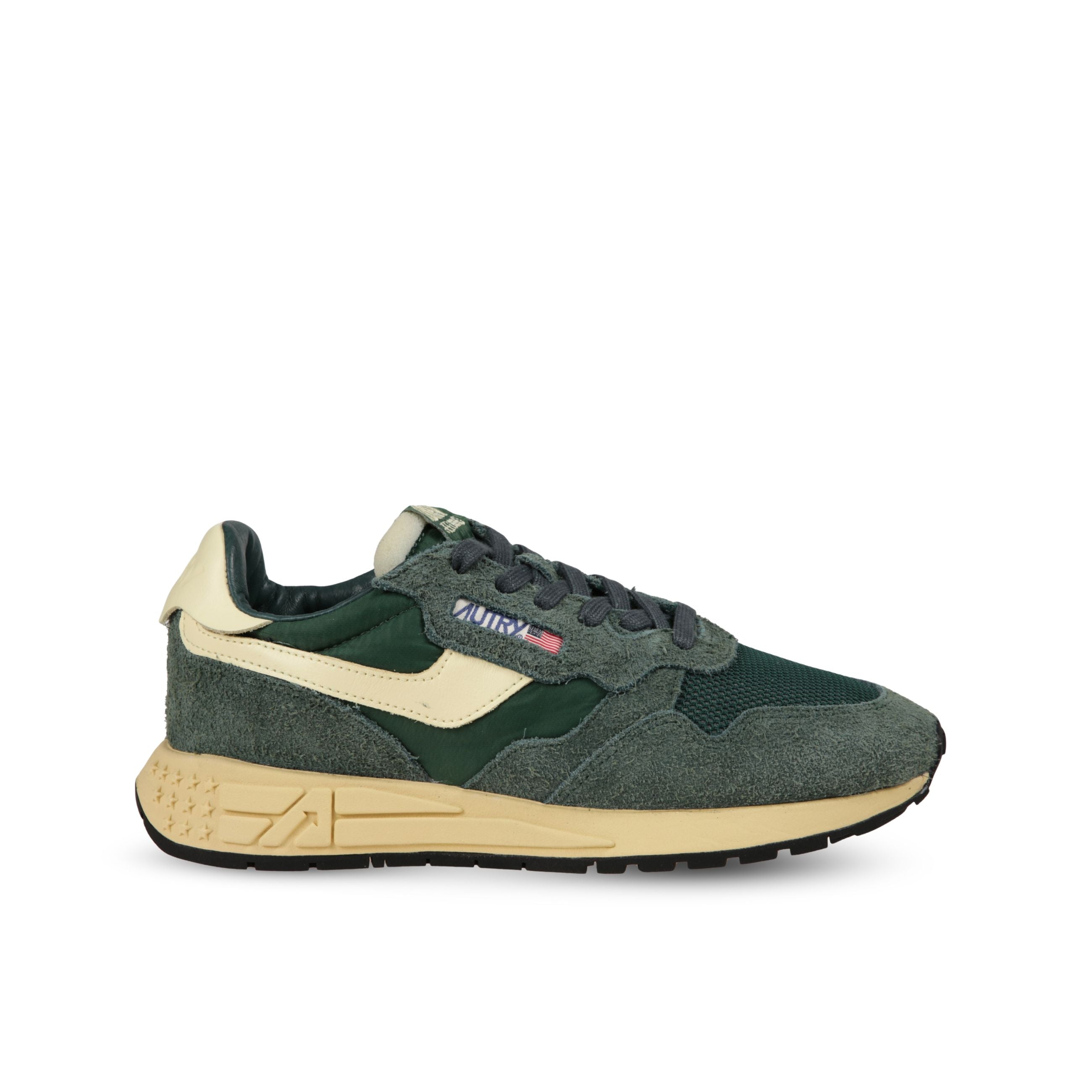 Sneakers autry reelwind. struttura in pelle e nylon con inserti in suede. talloncino ed inserti laterali in pelle con lieve effetto vintage.