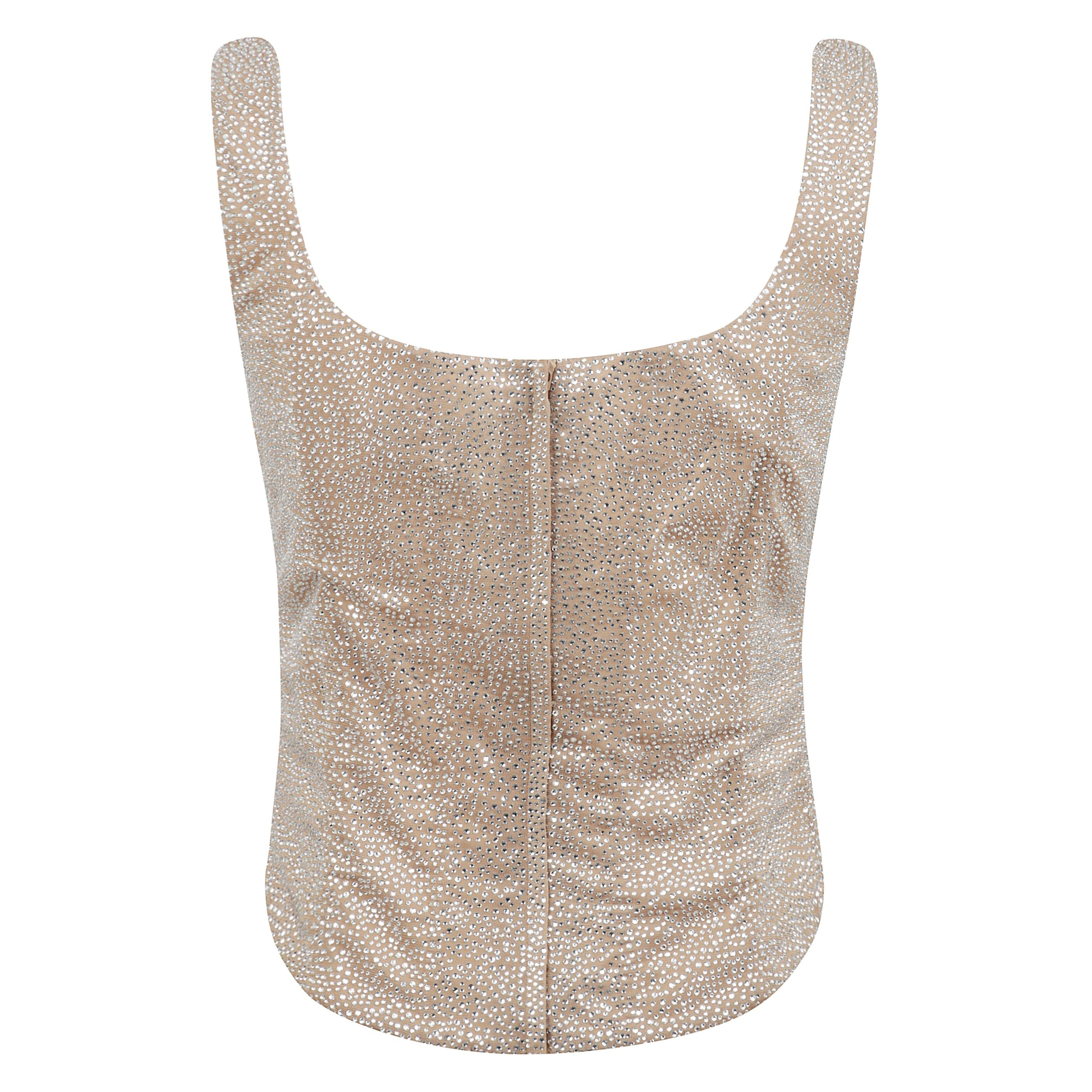 Top bustino con vestibilità comoda e versatile.