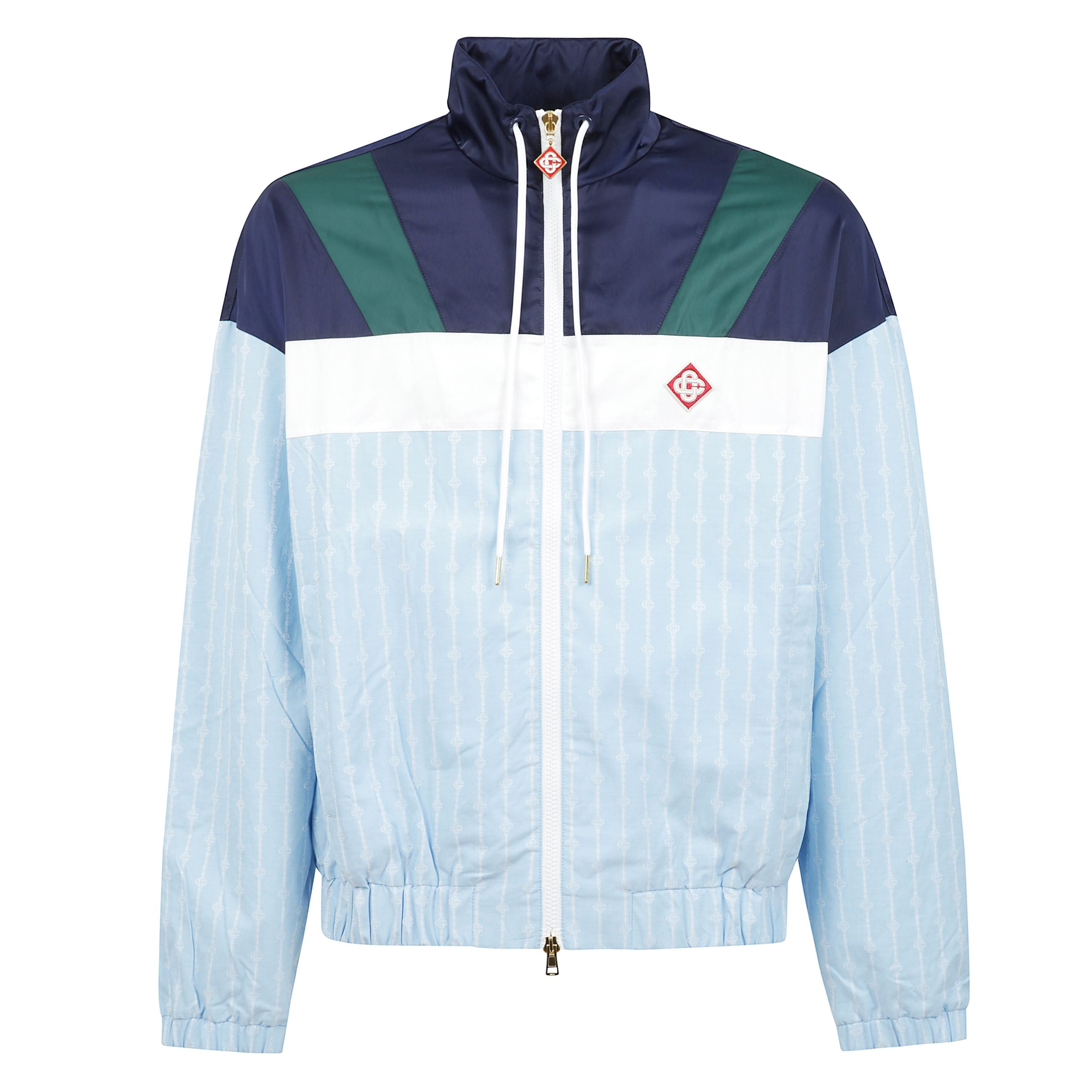 Giacca di colore blu con chiusura frontale a zip, due tasche a filetto laterali, orli elasticizzati e orlo elasticizzato.