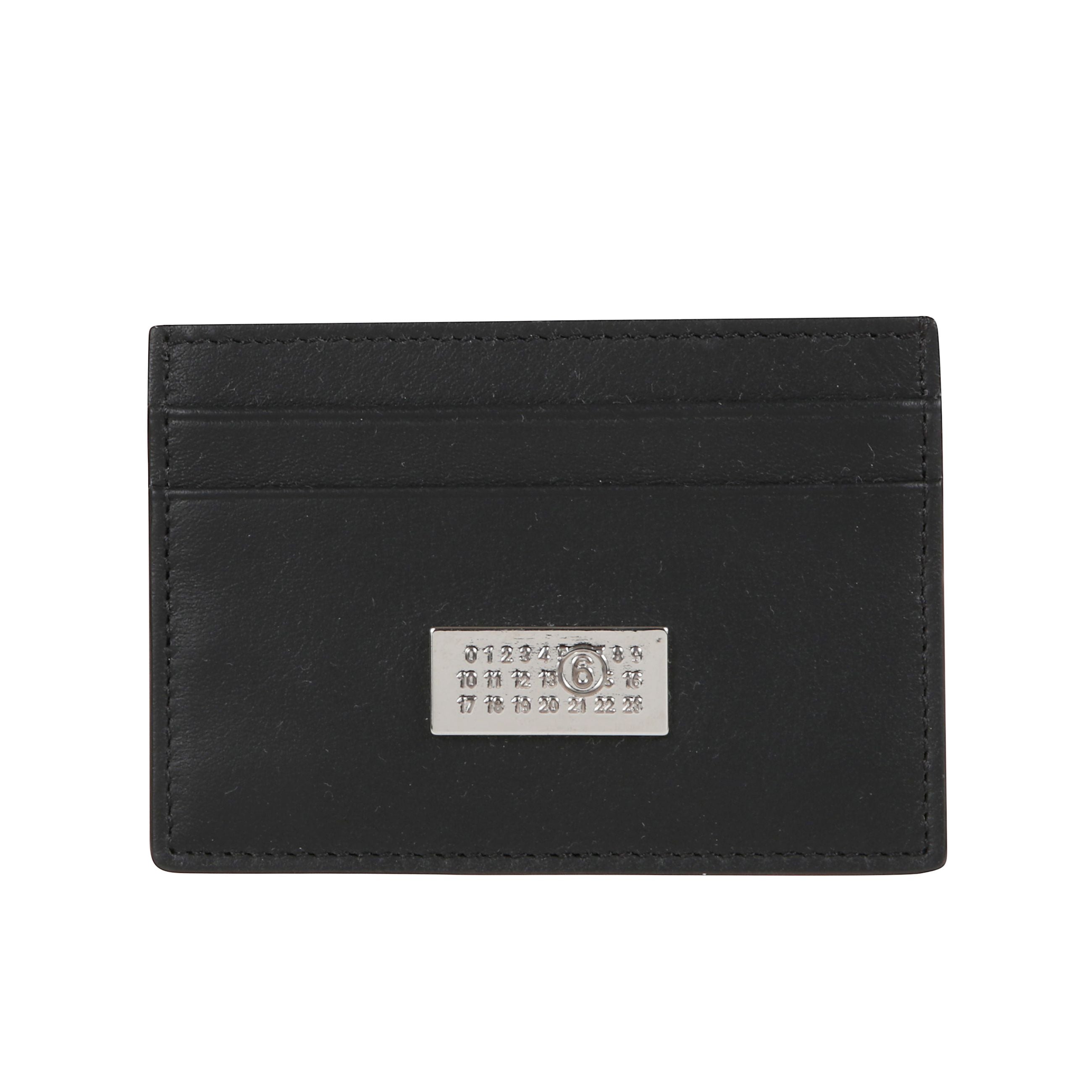 Portacarte in vera pelle. scomparti su entrambi i lati. logo maison margiela in evidenza.