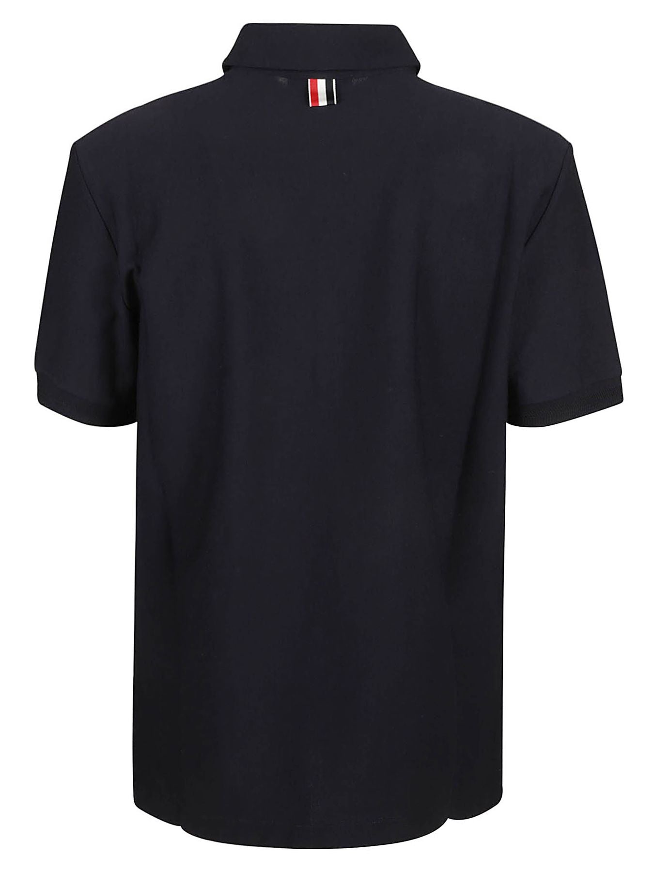 Short sleeve rib cuff collection polo in med weight jersey w/ eng rwb stripe.