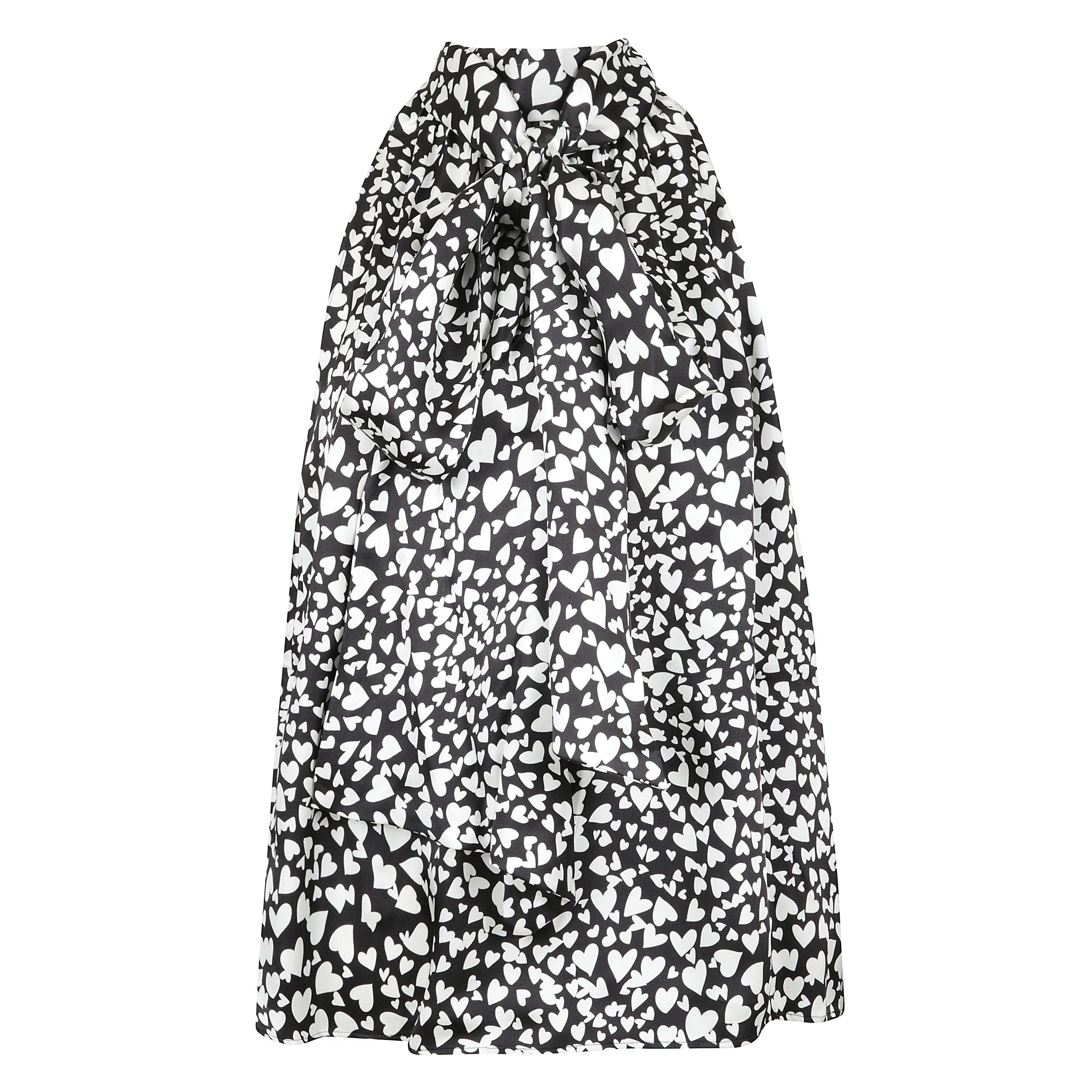 Il top anine bing brooke è caratterizzato da un design a collo alto con chiusura a cravatta posteriore. è realizzato in tessuto di seta di peso medio composto da 56% di seta e 44% di rayon. la parte superiore è fatta in cina e richiede solo lavaggio a