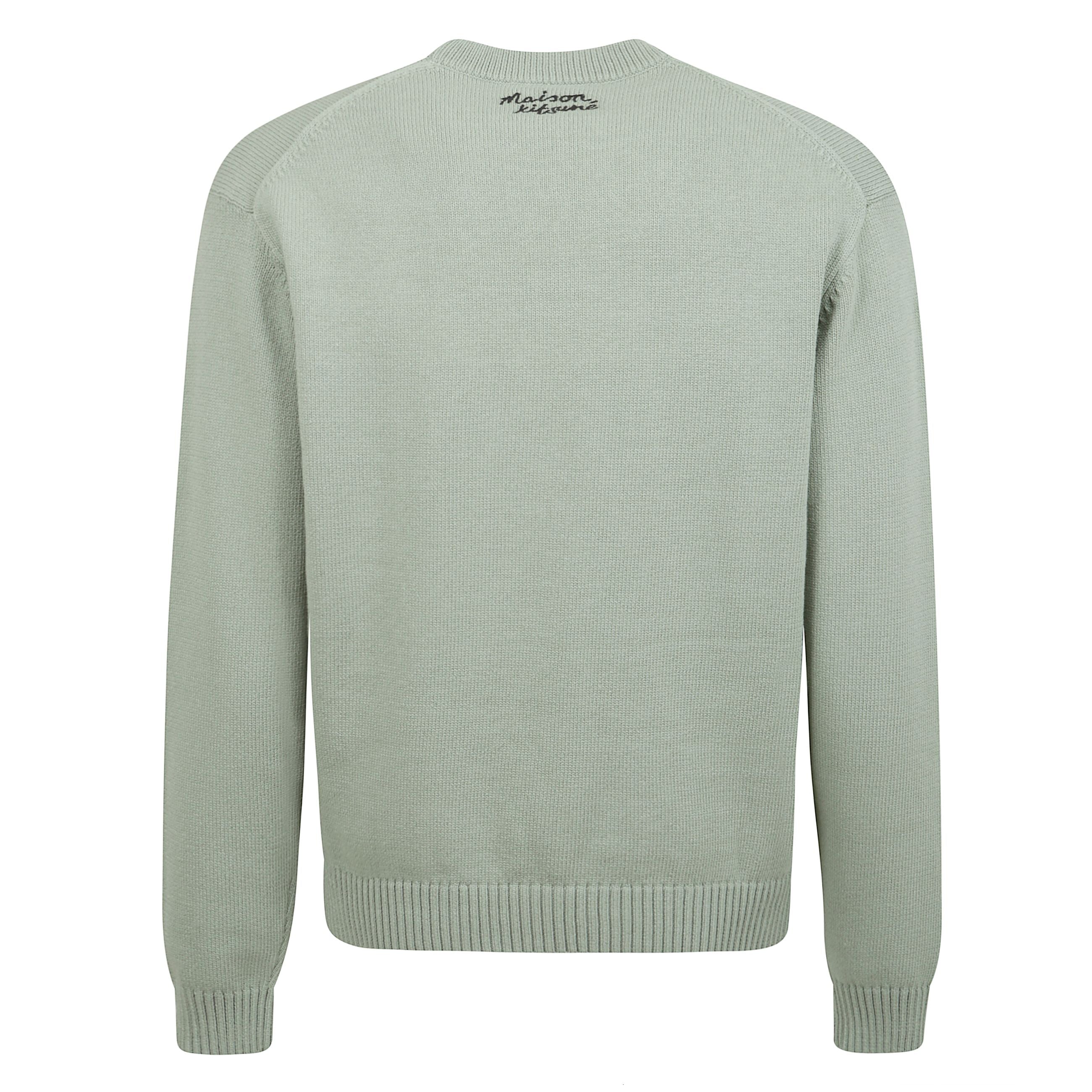 Maglione girocollo a maniche lunghe verde menta con polsini e fondo a costine.