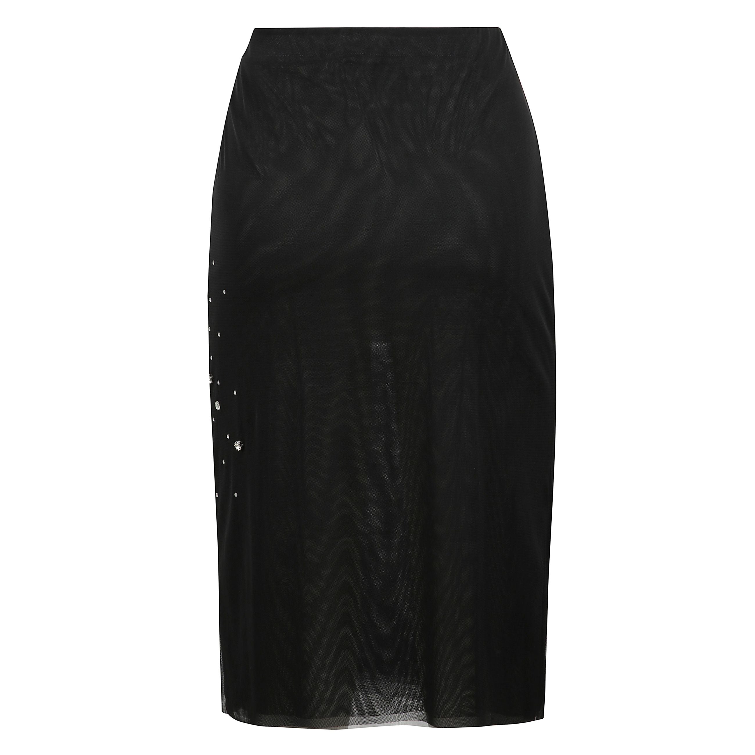 Crystal longuette in tulle semi trasparente con chiusura a zip laterale nascosta e applicazioni di cristalli all over.