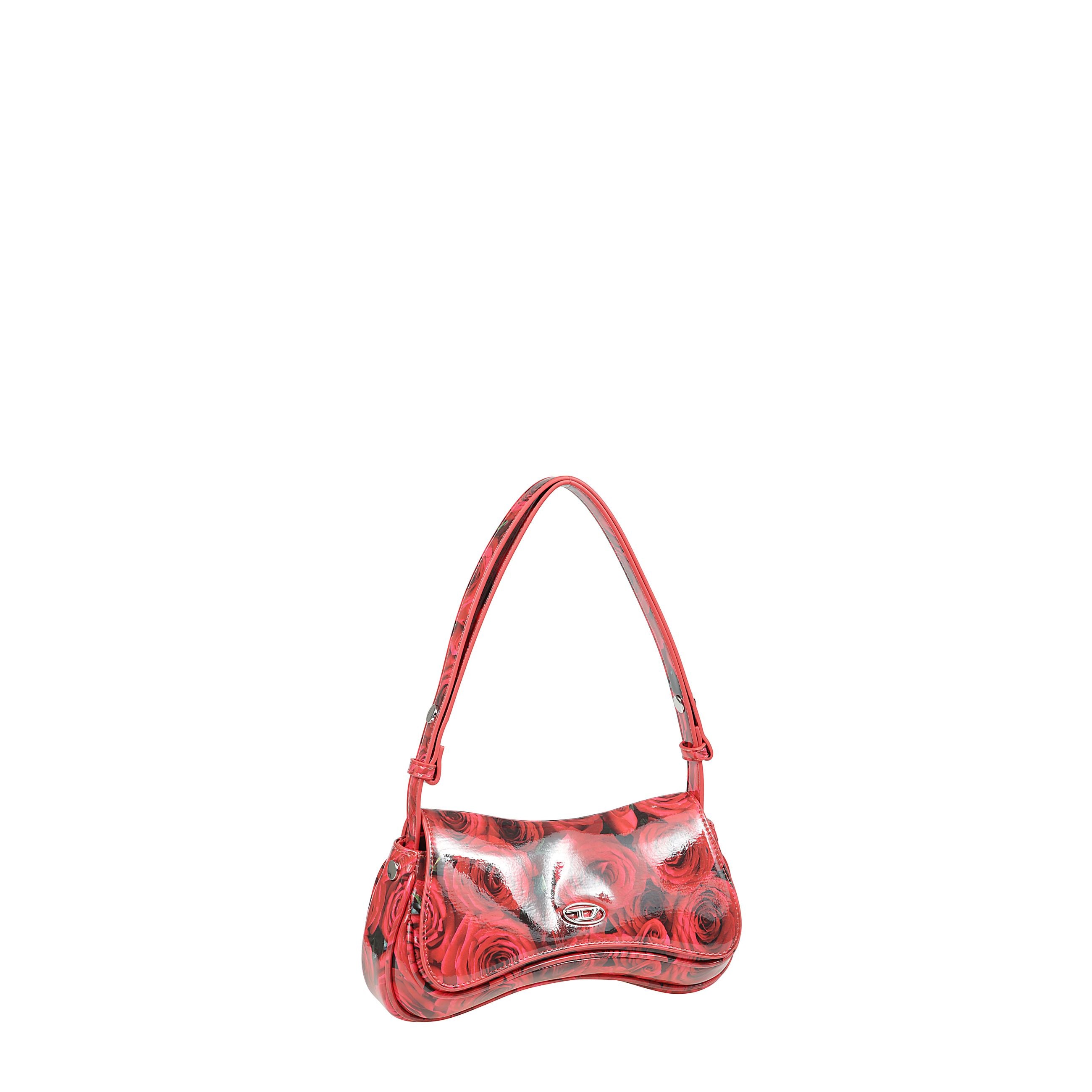 Questa clutch versatile ha una forma ironica, ispirata ai controller per videogiochi. realizzata in pu riciclato lucido con stampa all-over, è decorata con una placca metallica oval d sulla patta. la tracolla regolabile permette di indossarla crossbody o