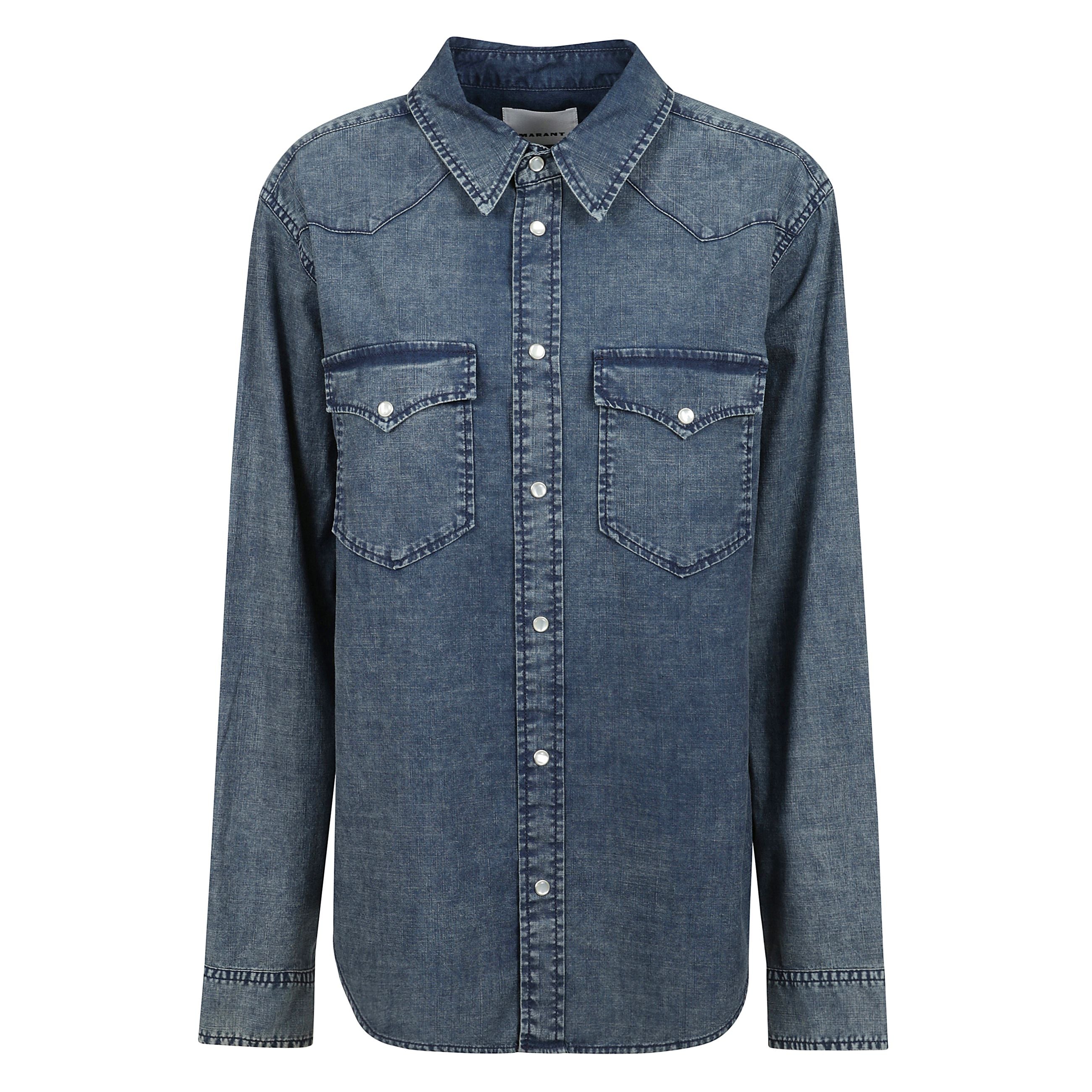 Camicia vasco con chiusura frontale con bottoni a pressione, due tasche con patta sul petto, polsini con bottoni a pressione.